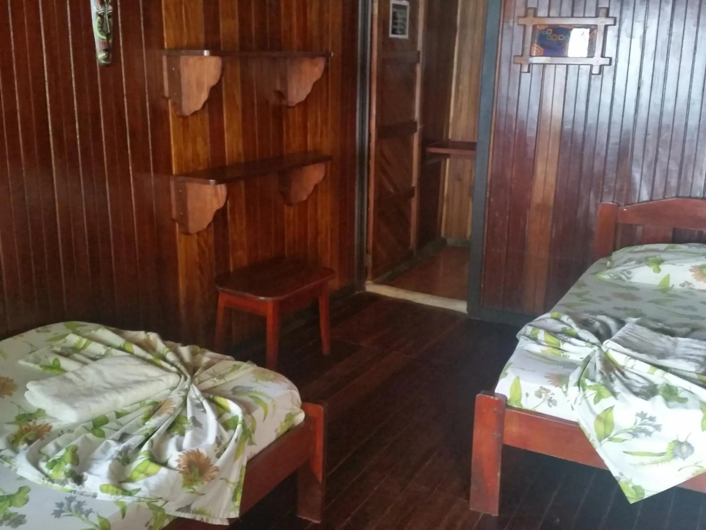 Photo of the whole room, Bed in Hotel Cabinas Mar Y Cielo