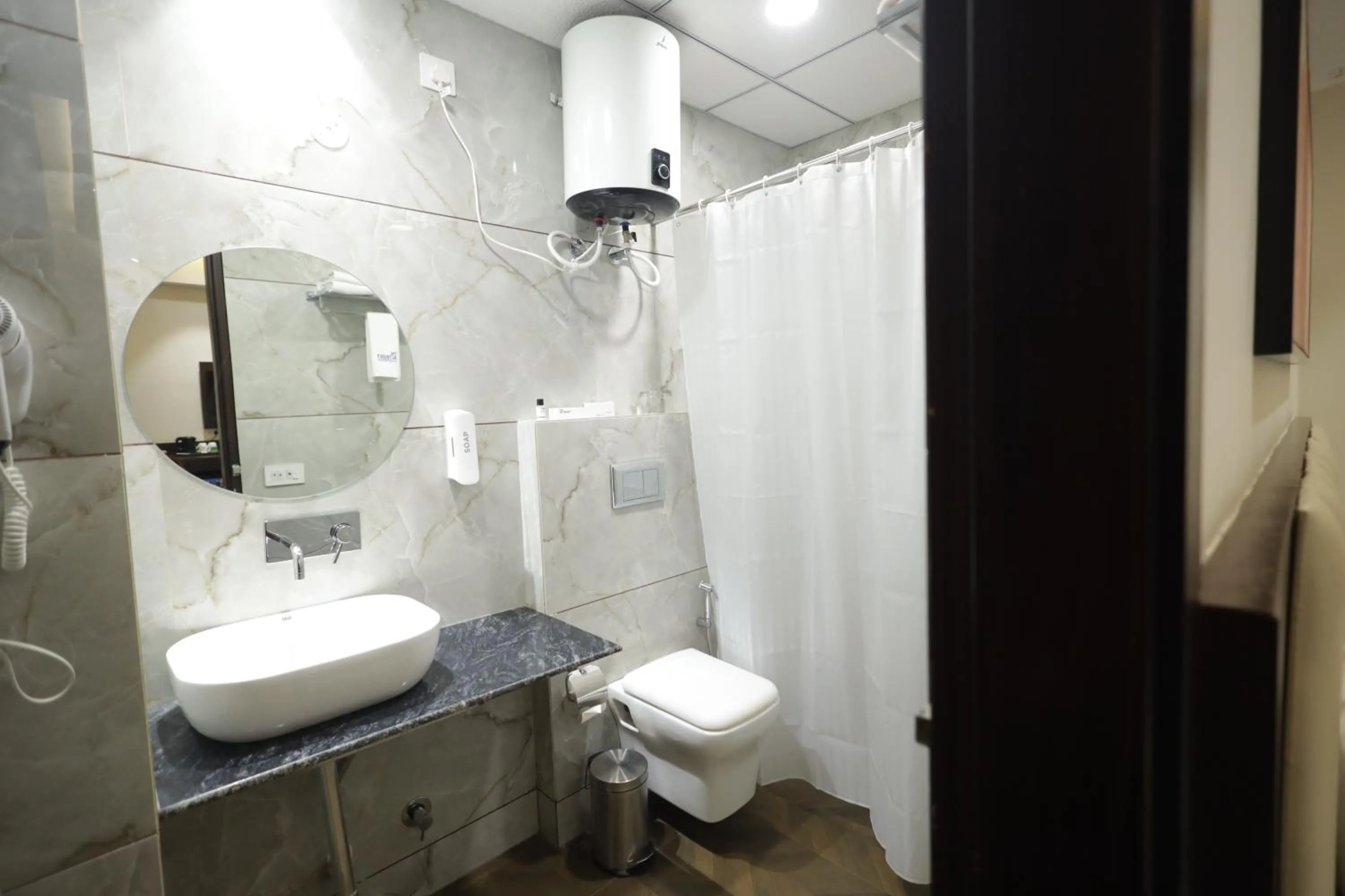 Bathroom in The Altruist Gurugram Hotel