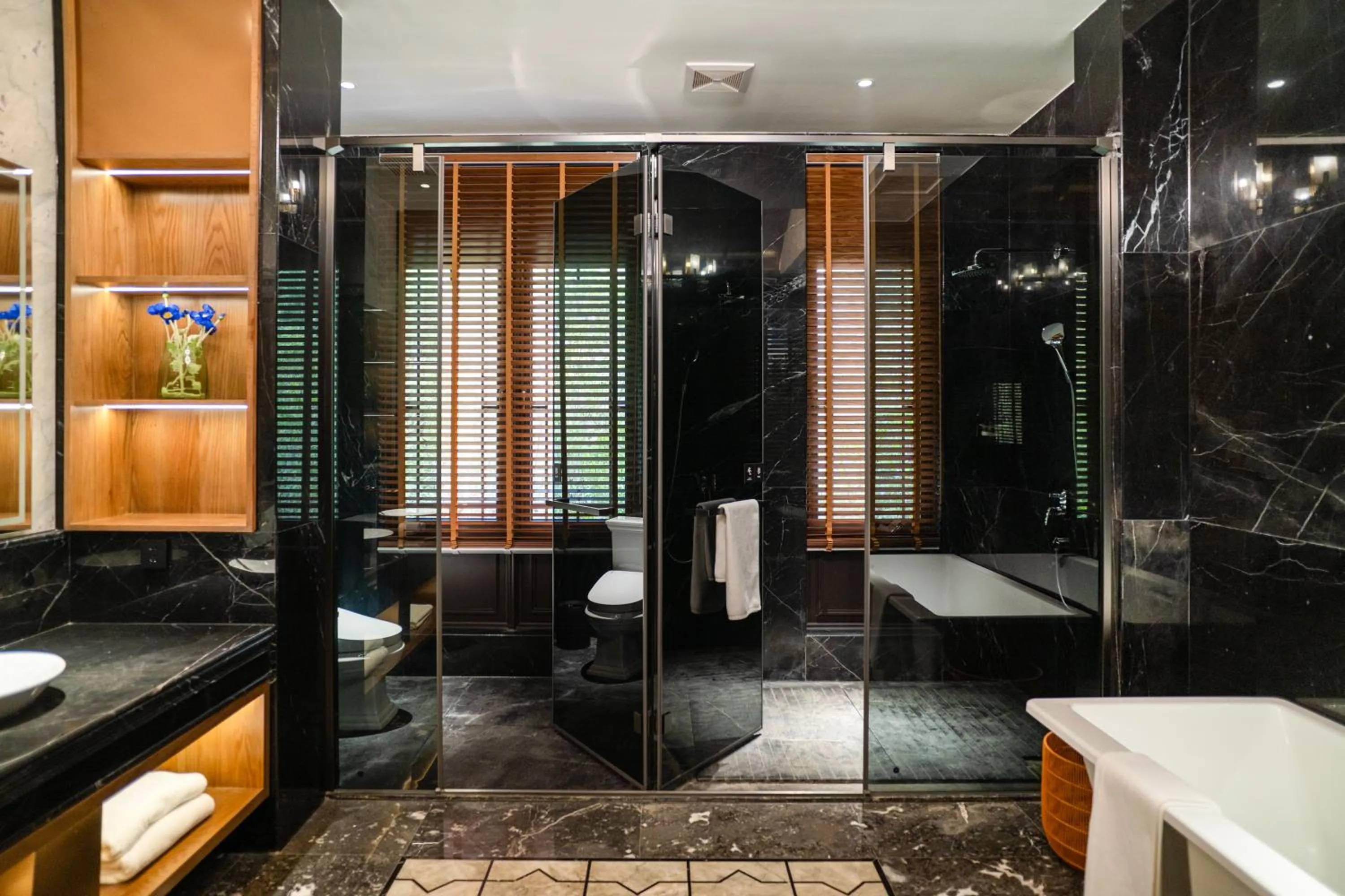 Shower in Moonrise Hotels Resorts