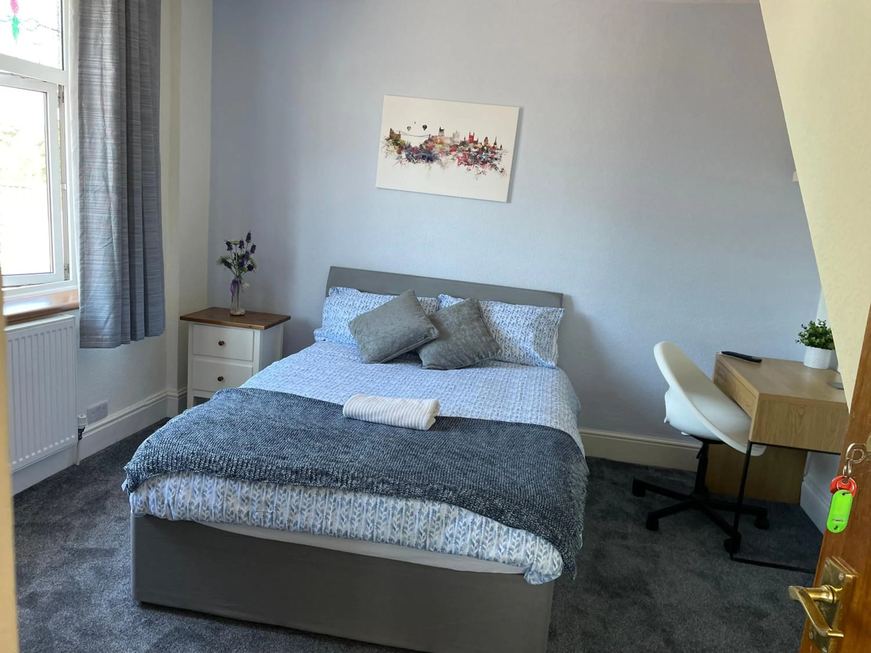 Bed in Maple Leaf Guest House