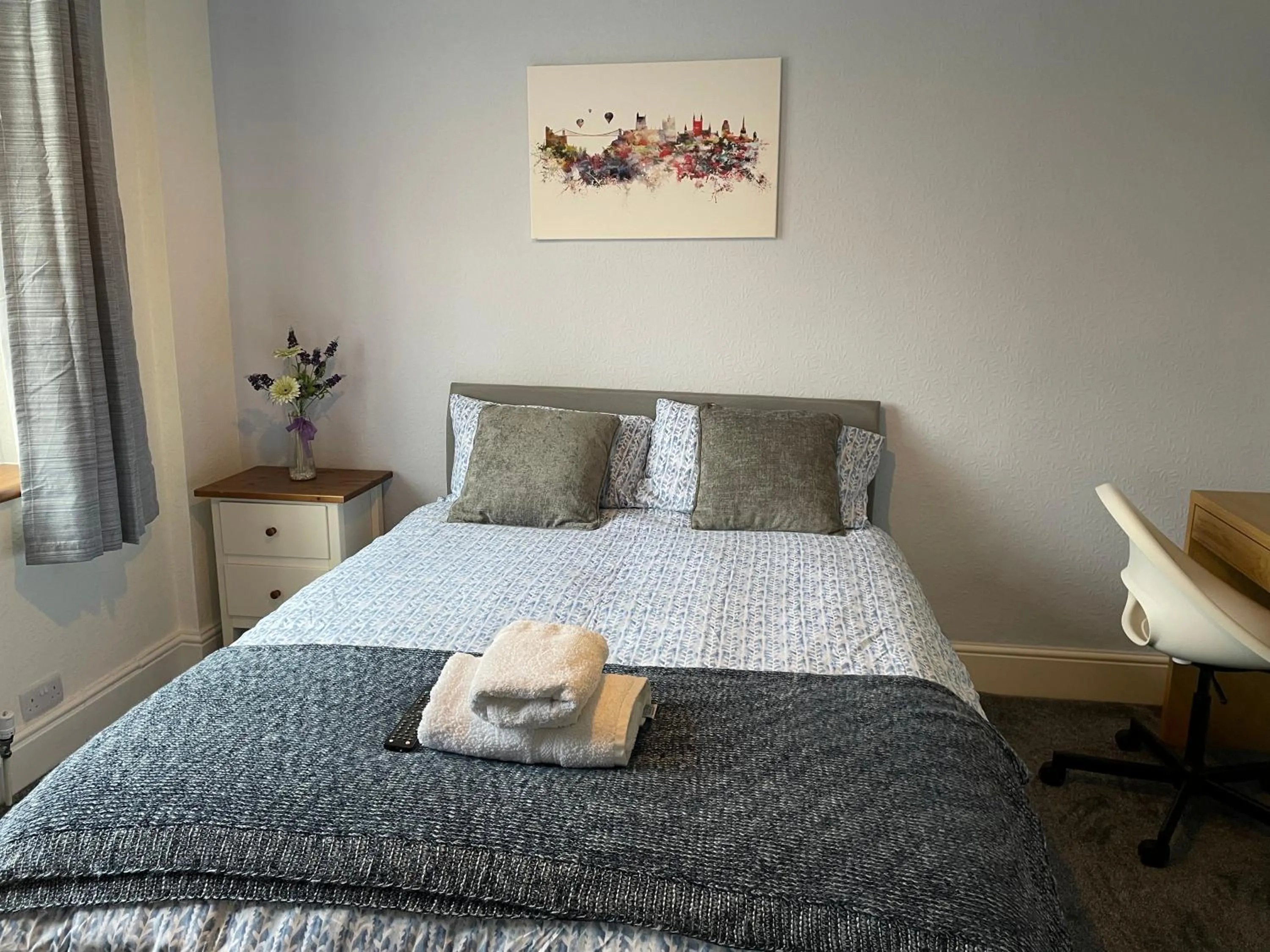 Bed in Maple Leaf Guest House