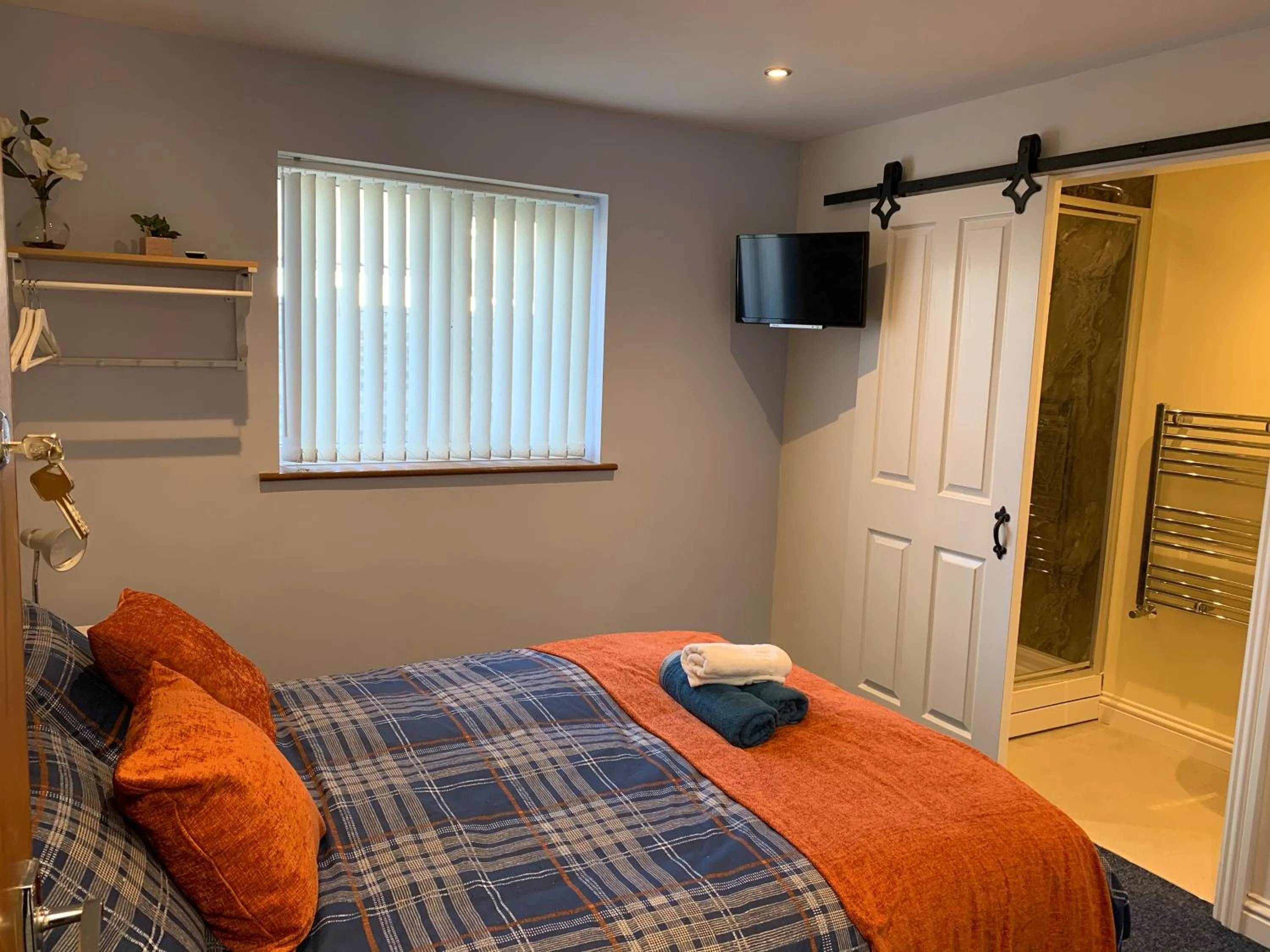 Bed in Maple Leaf Guest House
