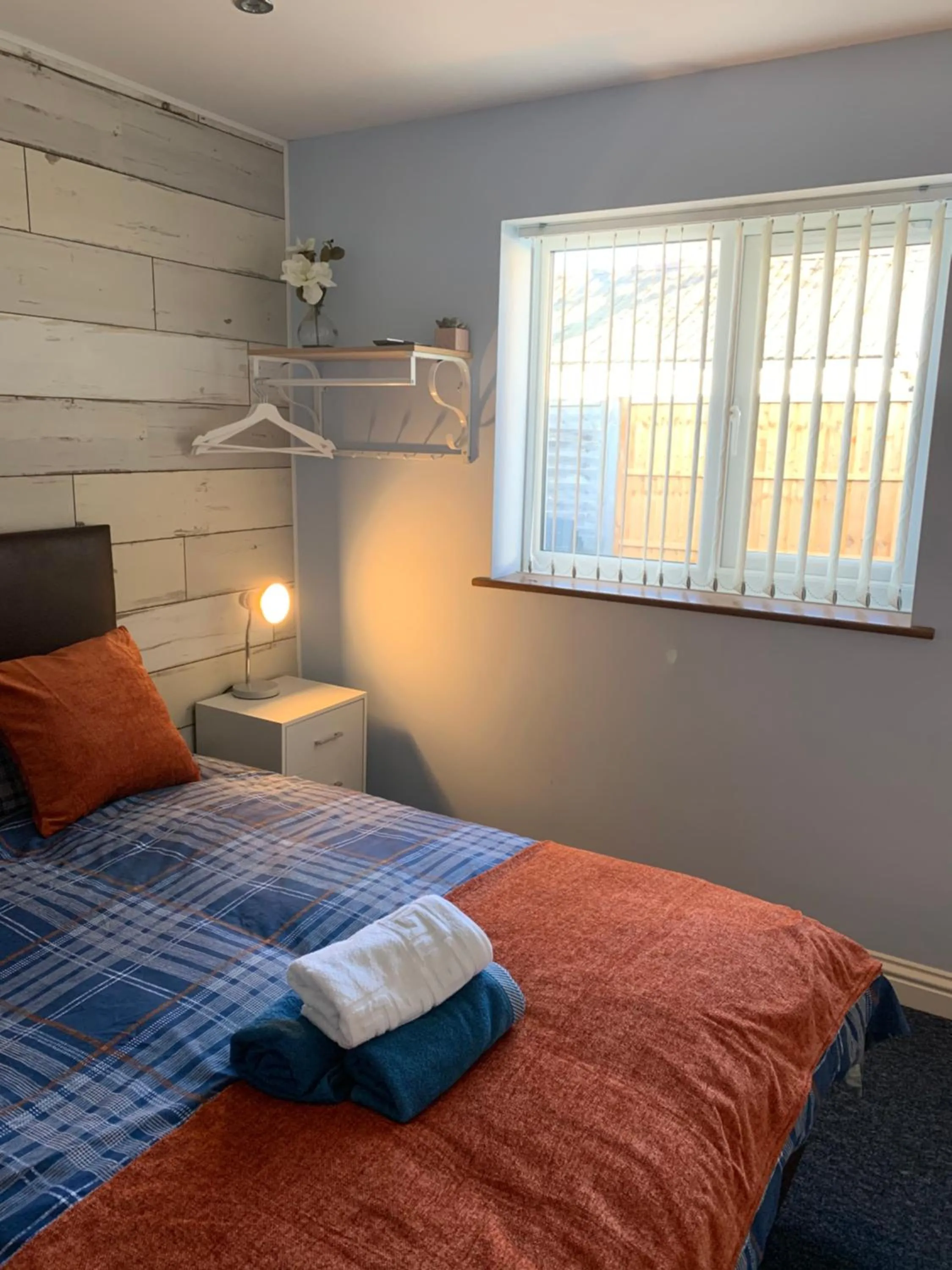 Bed in Maple Leaf Guest House