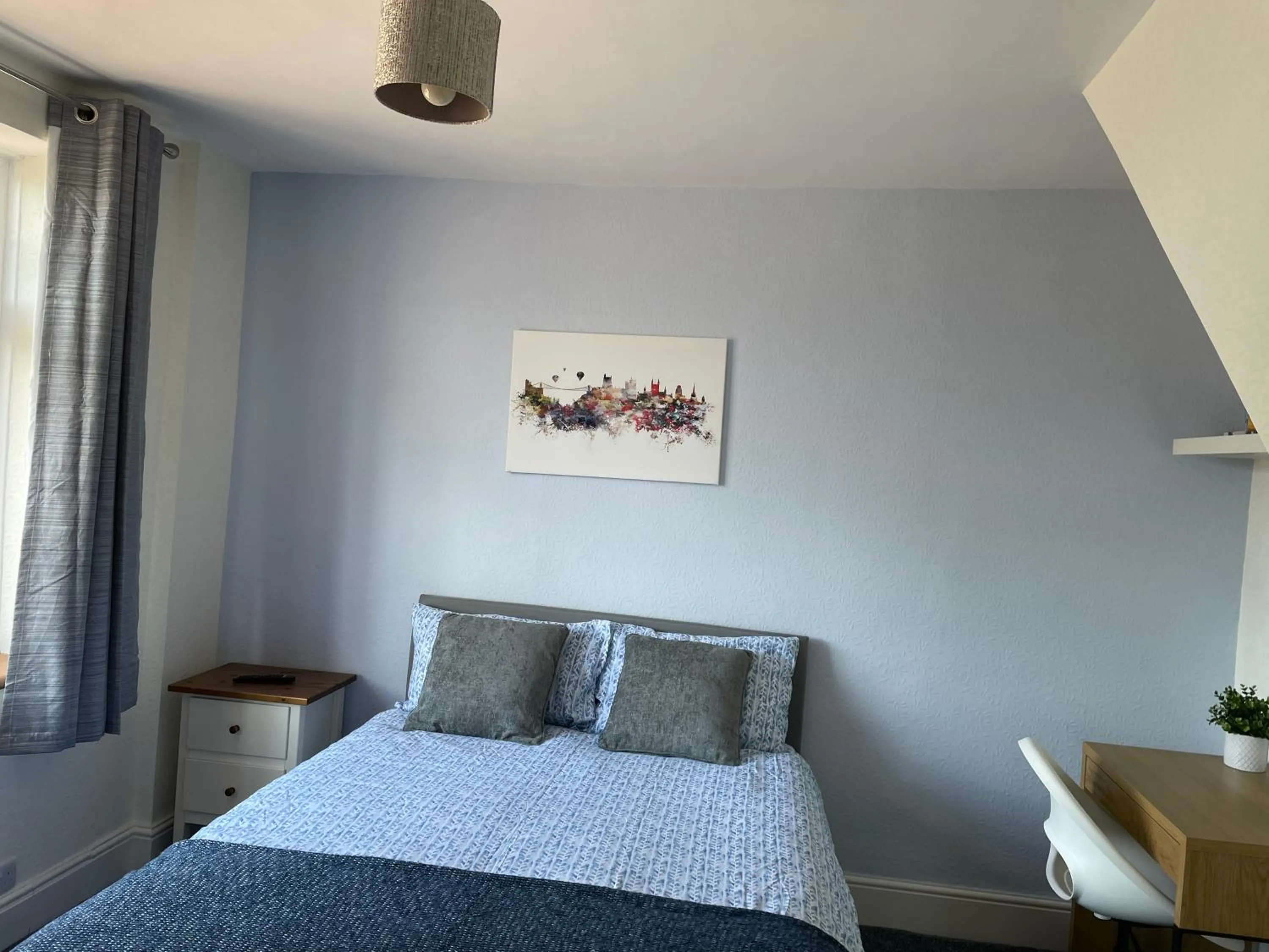 Bed in Maple Leaf Guest House