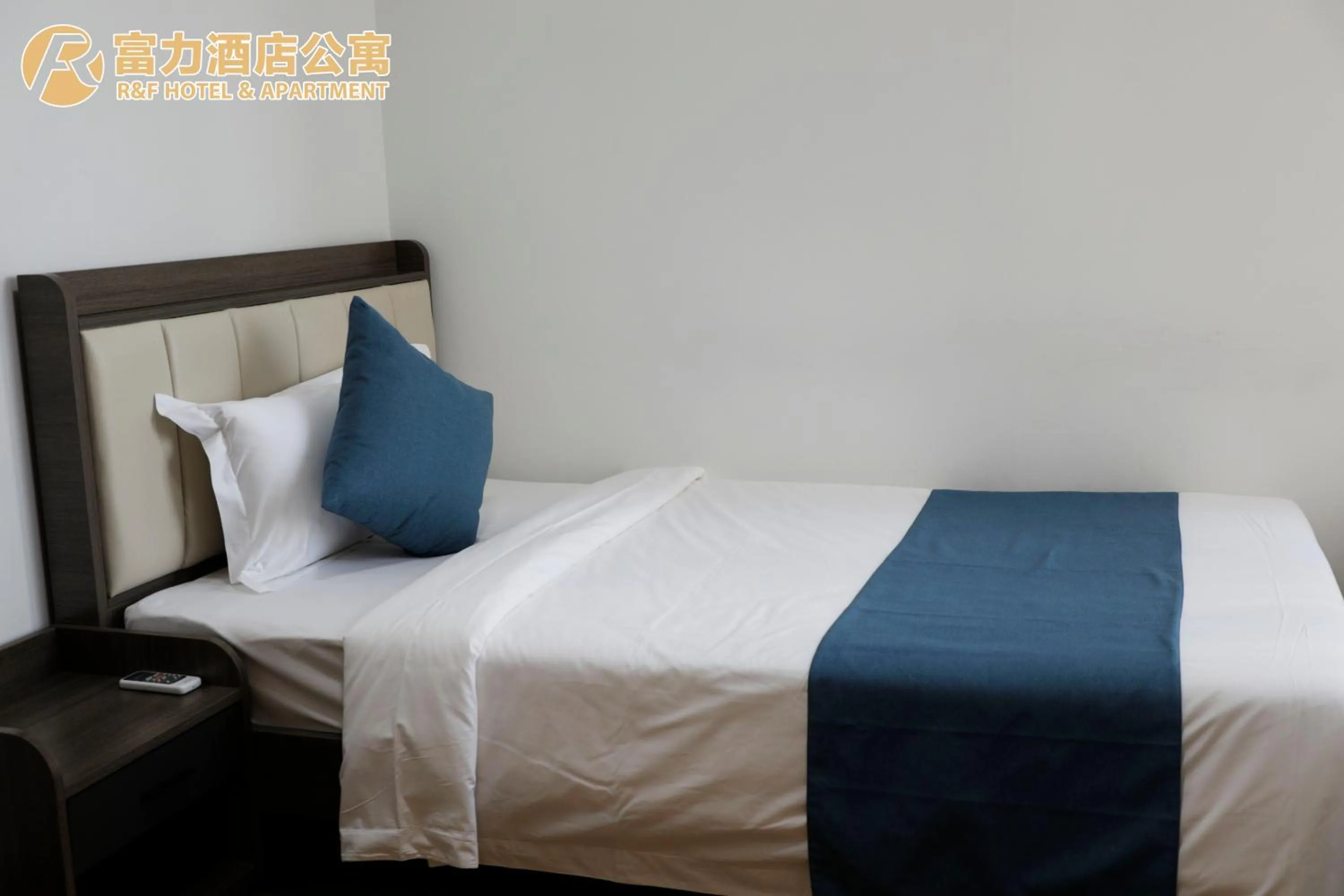 Bed in R&F Hotel and Apartment