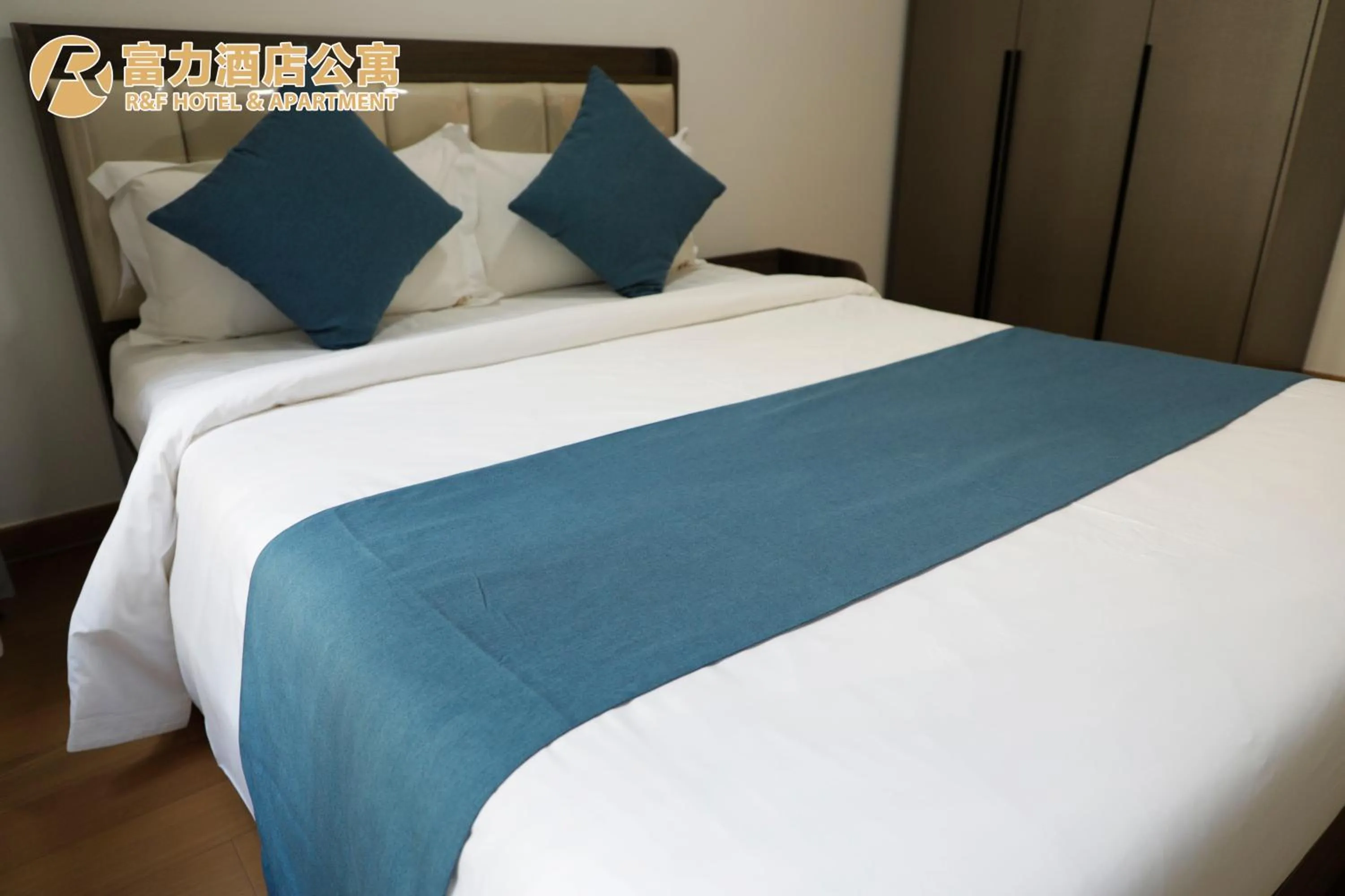 Bed in R&F Hotel and Apartment