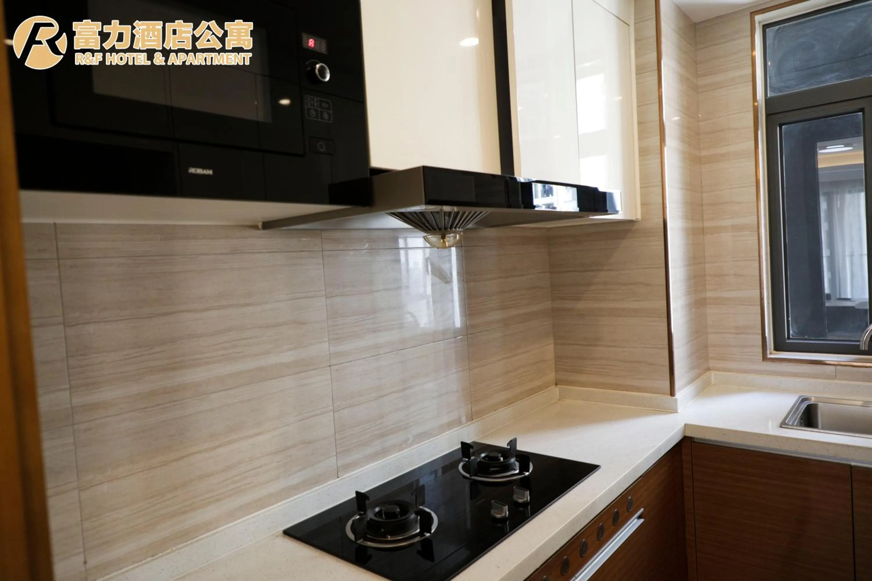 kitchen in R&F Hotel and Apartment