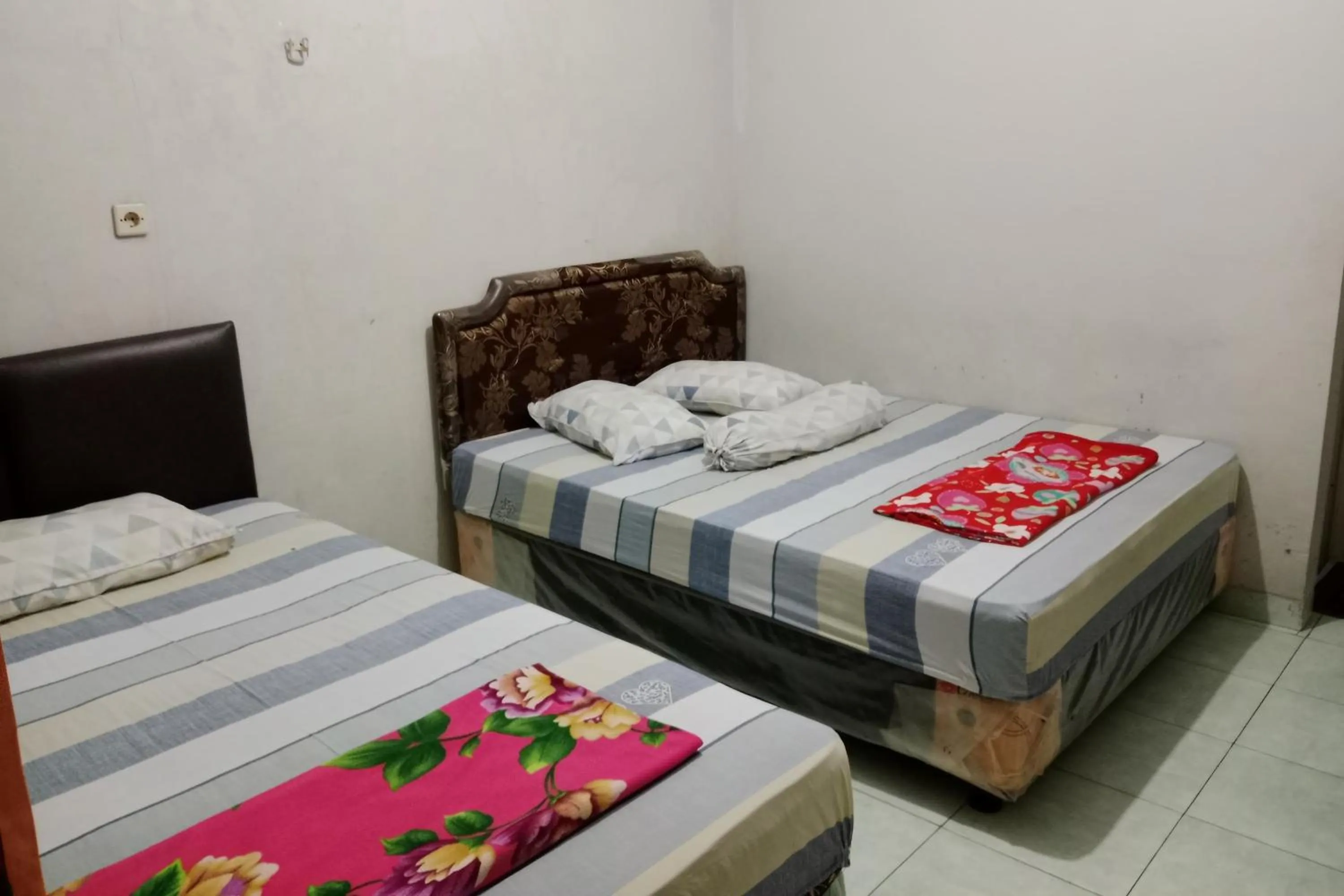 Bedroom, Bed in Hotel Malinda Pangandaran