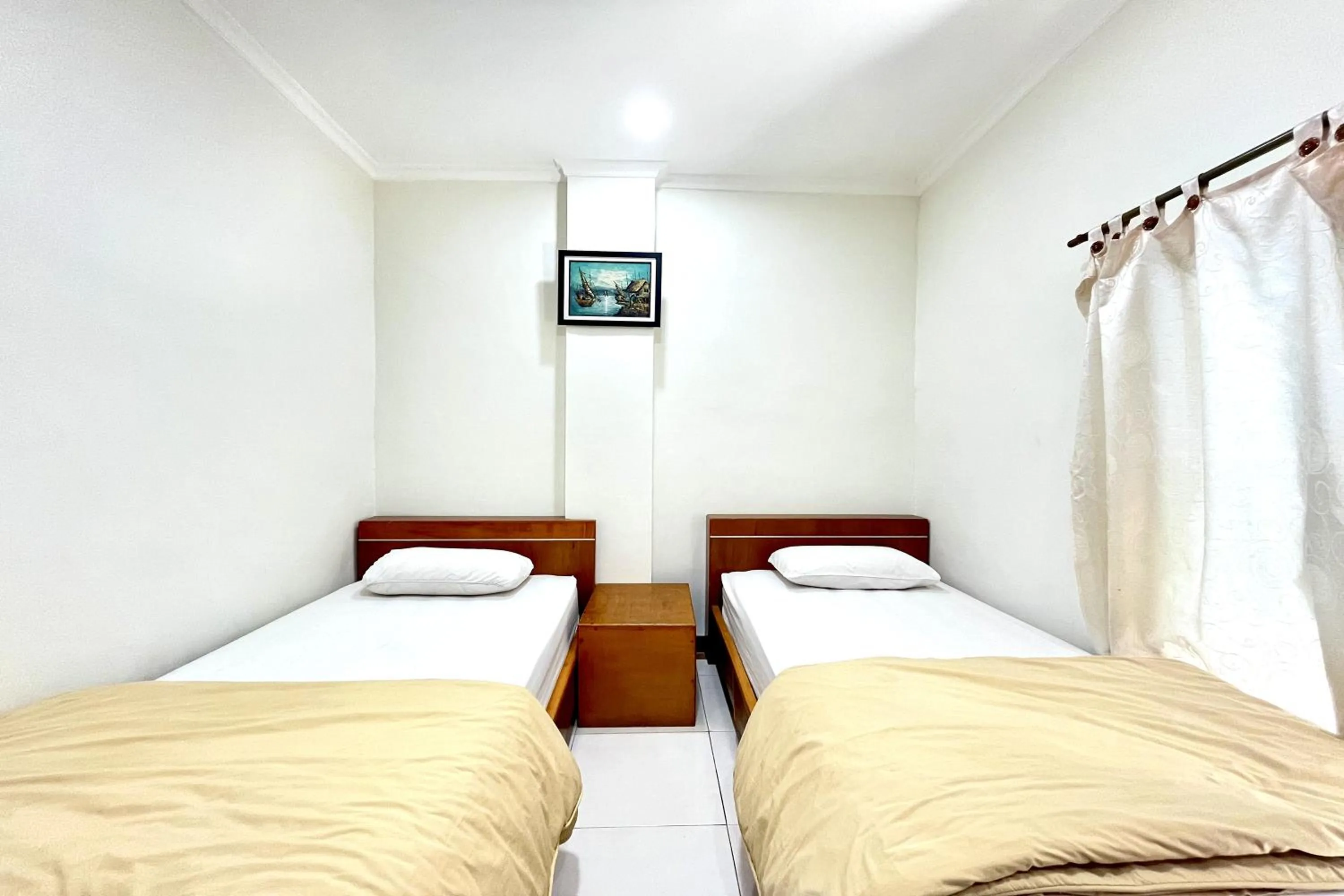 Bed in Maison Hotel Bukittinggi