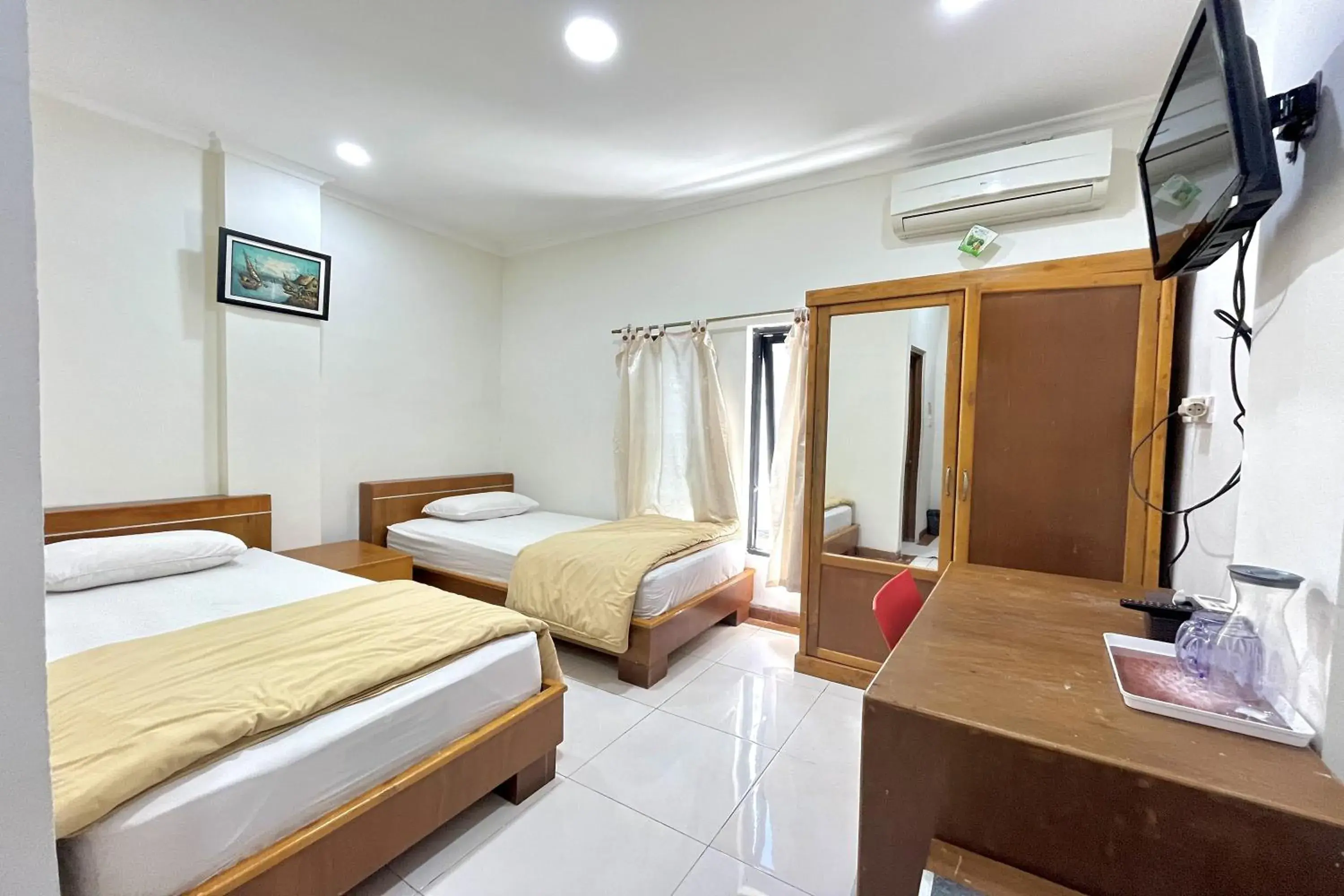 Bed in Maison Hotel Bukittinggi Bed in Maison Hotel Bukittinggi