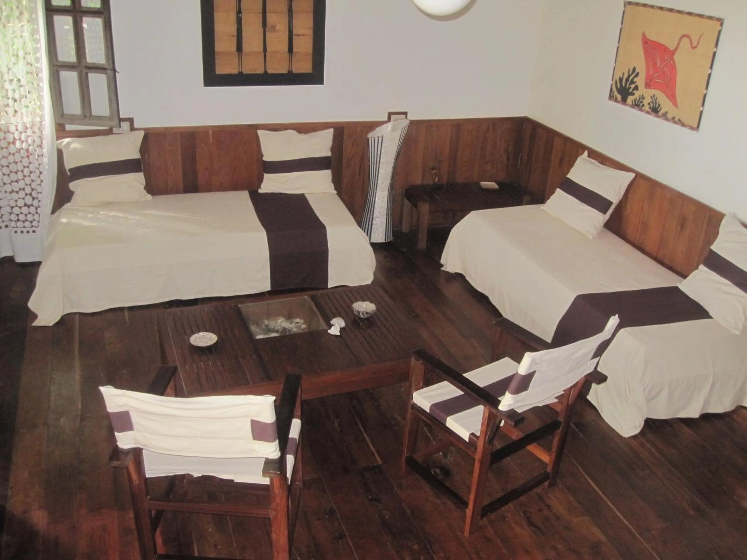 Living room, Bed in Corail Noir Hotel