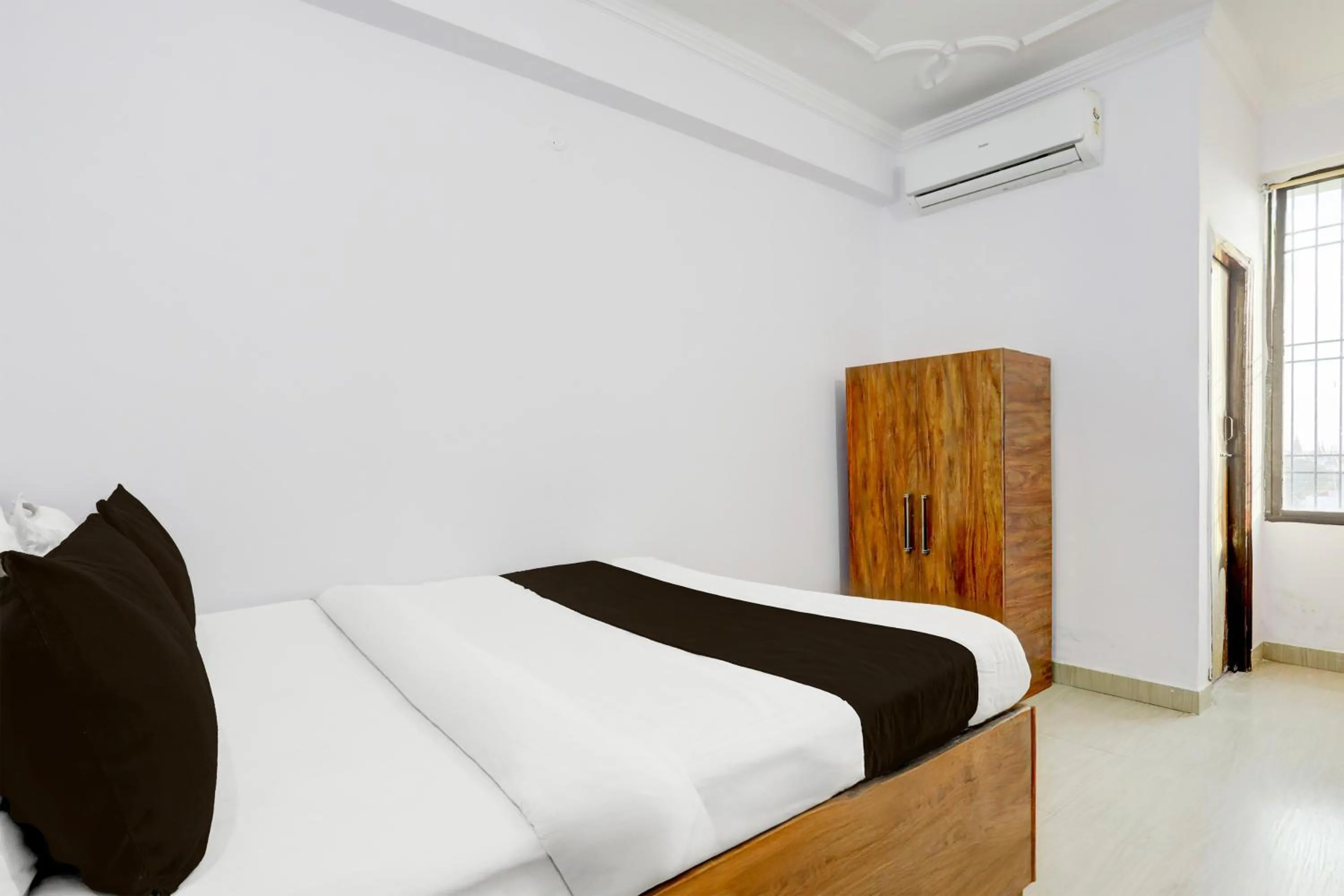 Bedroom, Bed in Super Hotel O Rajeev Nagar Formerly Happy Journey