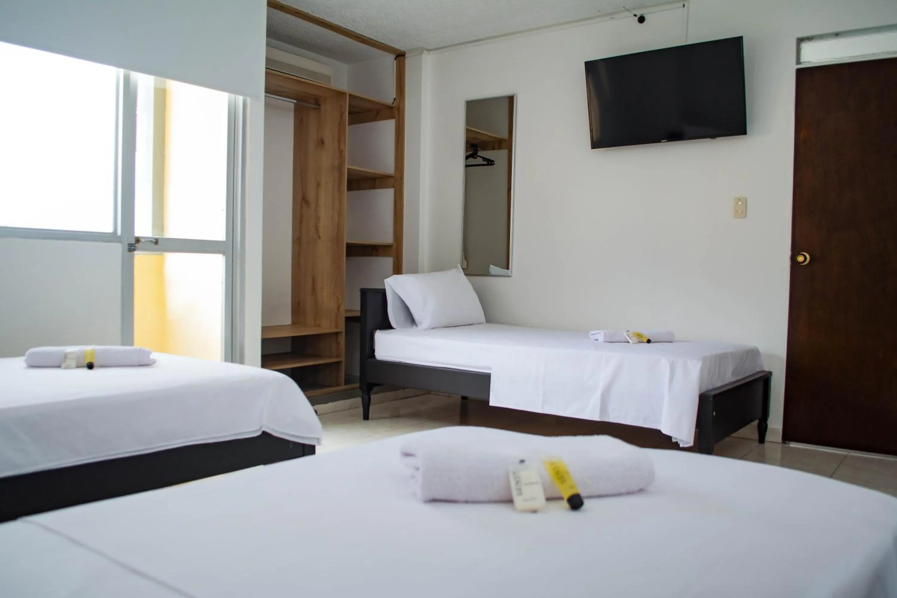 room service, Bed in Hotel Centauros del Llano