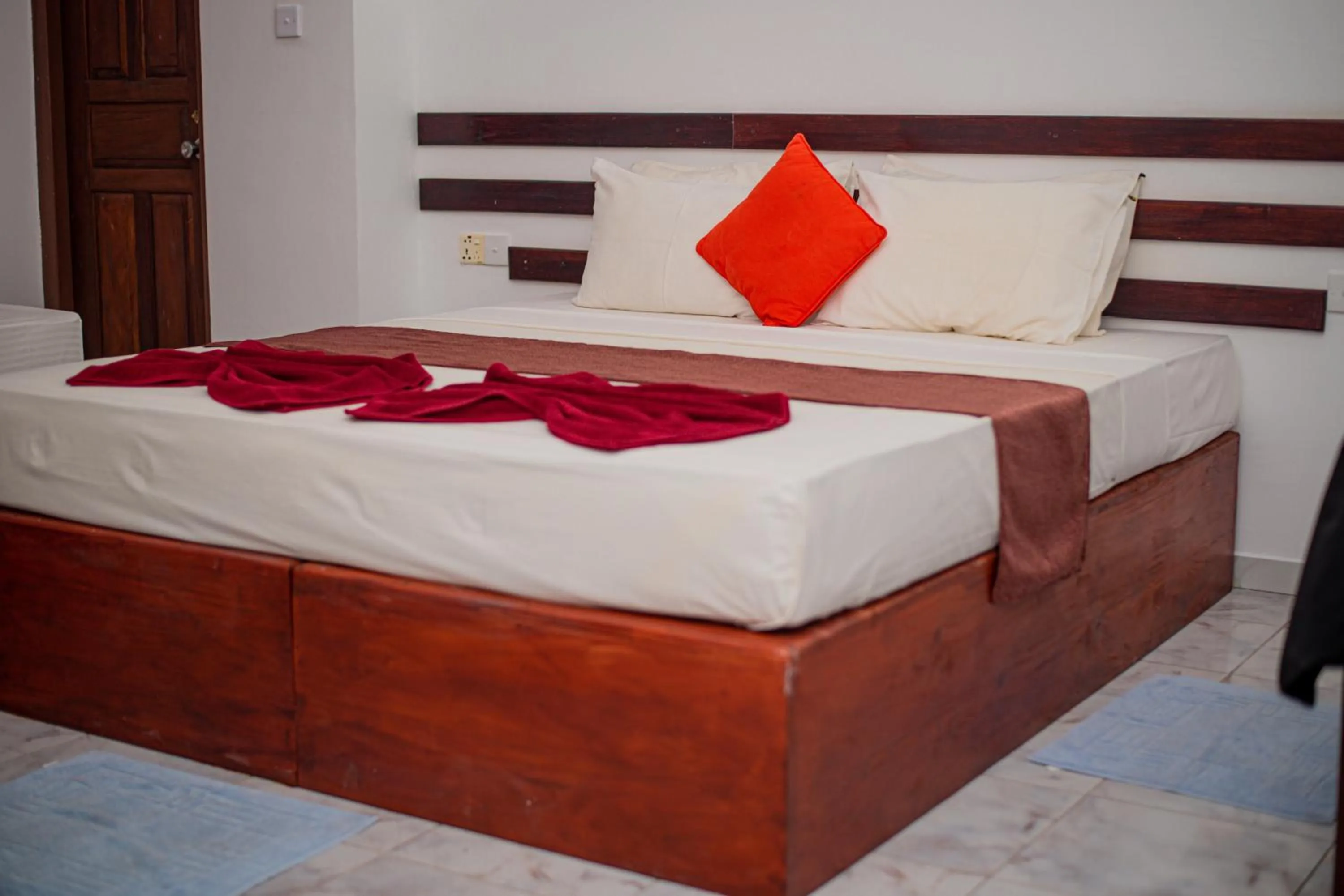 Bed in Sundowners Guesthouse