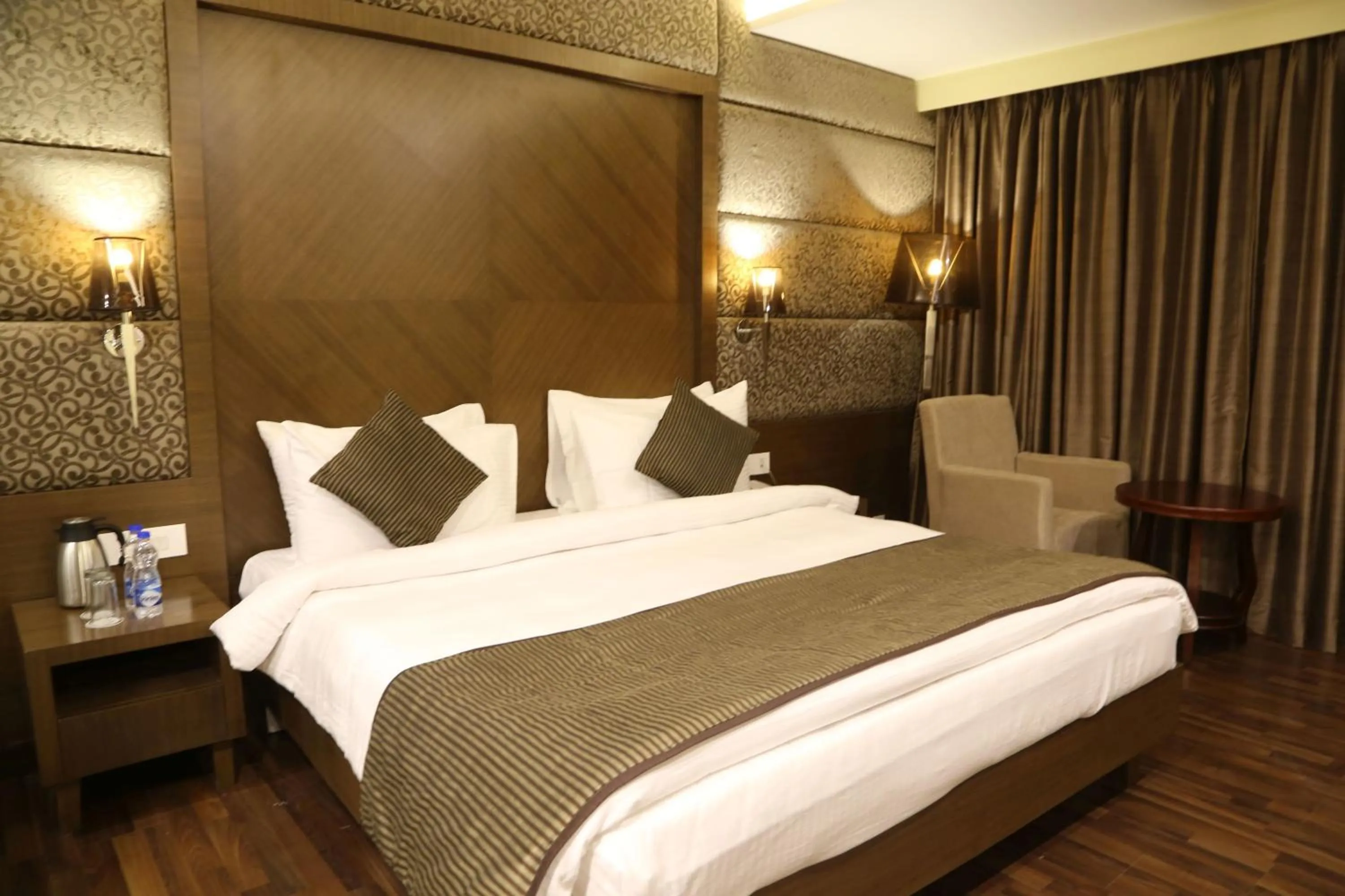 Bedroom, Bed in The Fern Residency Mundra