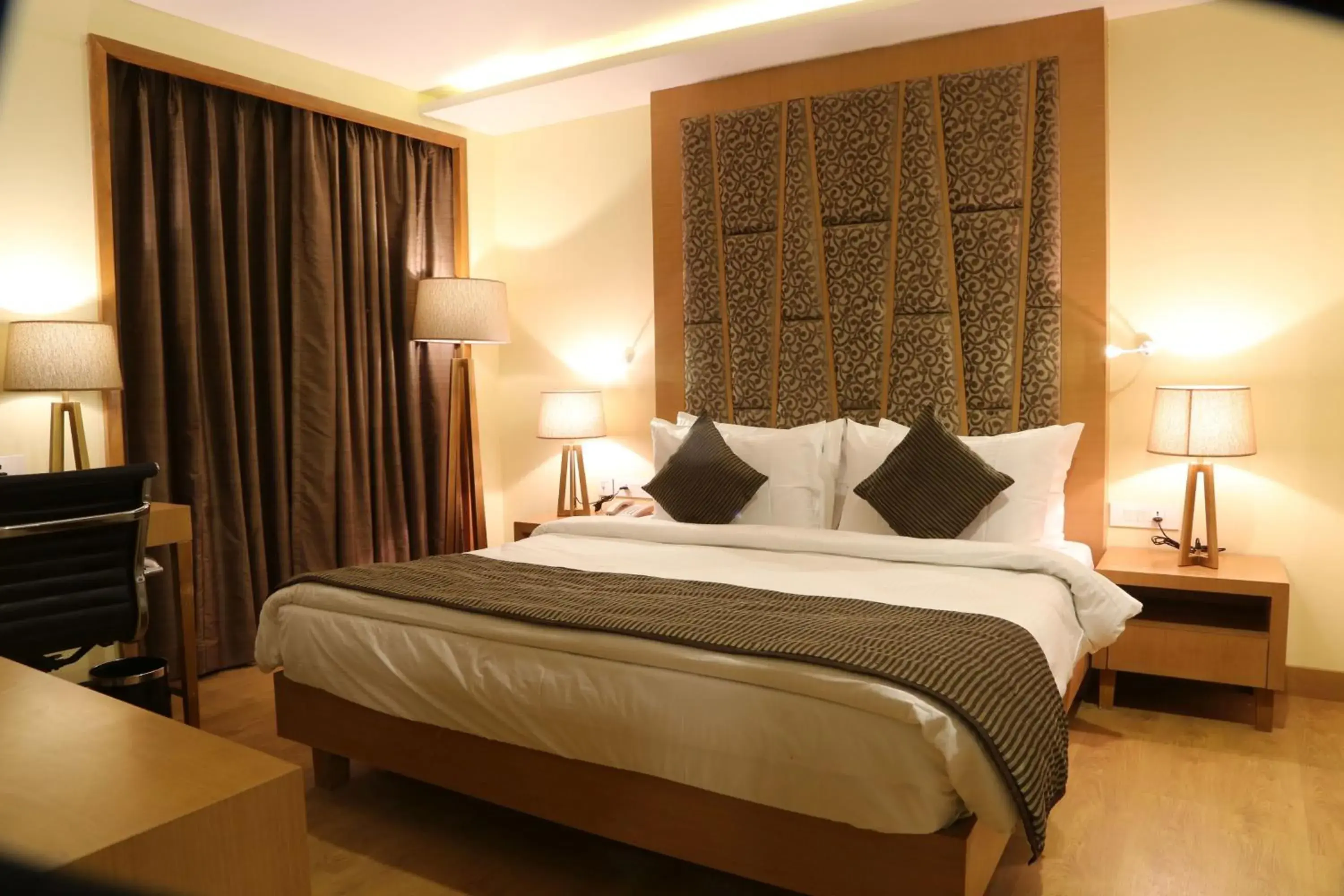 Bedroom, Bed in The Fern Residency Mundra Bedroom, Bed in The Fern Residency Mundra