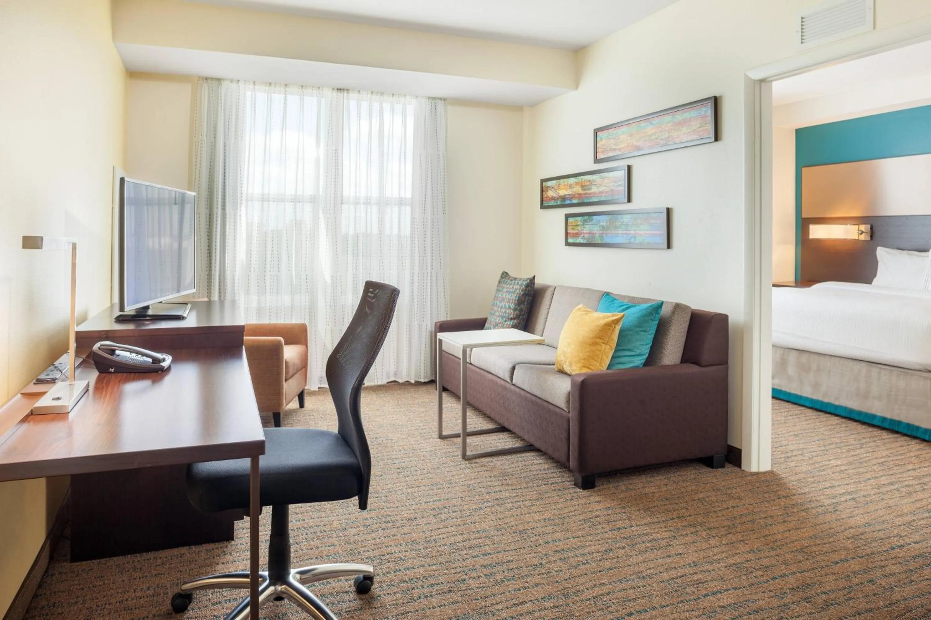 Living room, Bed in Residence Inn by Marriott Orlando Downtown