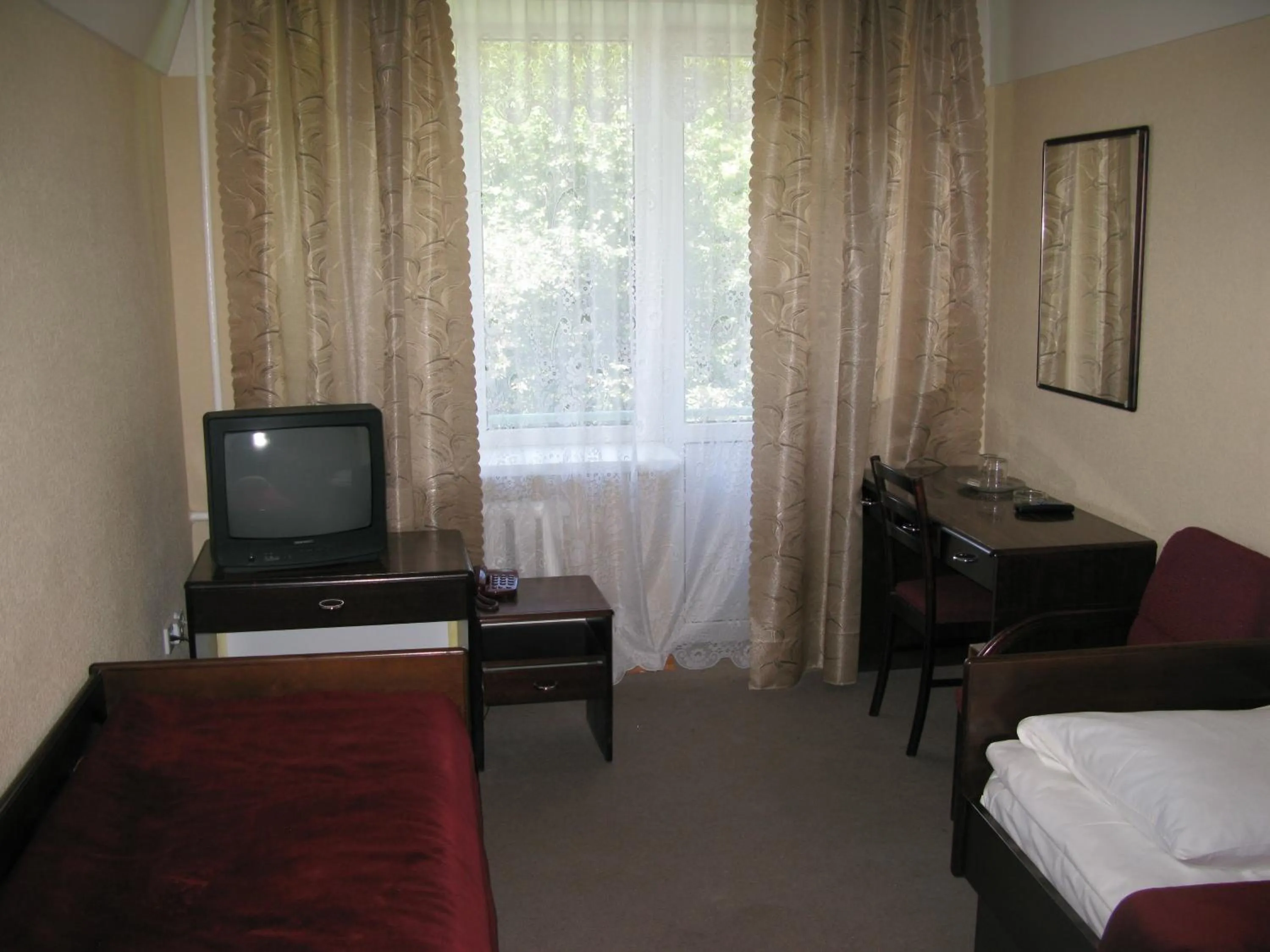 Seating area, Bed in Motel Poltava