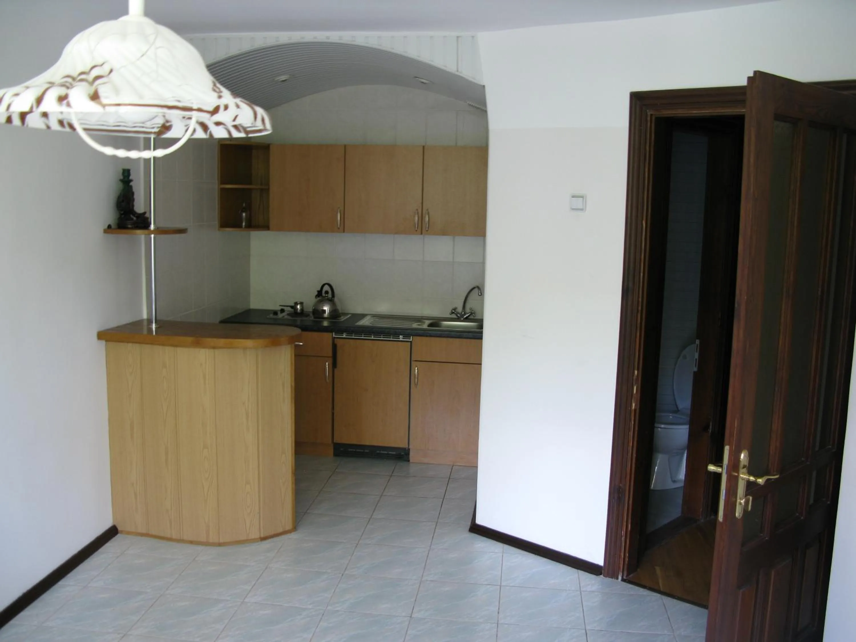 Kitchen or kitchenette in Motel Poltava