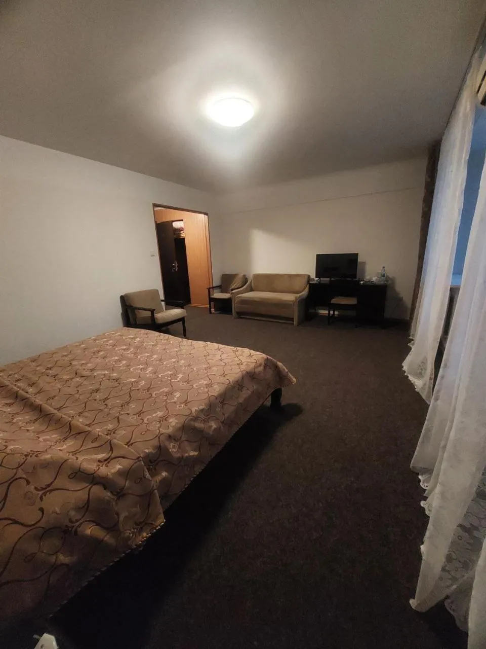 Communal lounge/ TV room, Bed in Motel Poltava