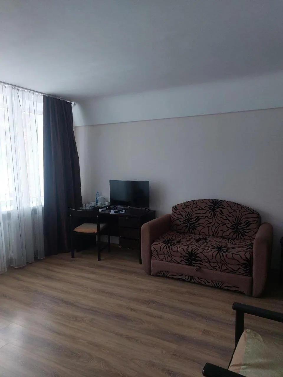 Communal lounge/ TV room in Motel Poltava