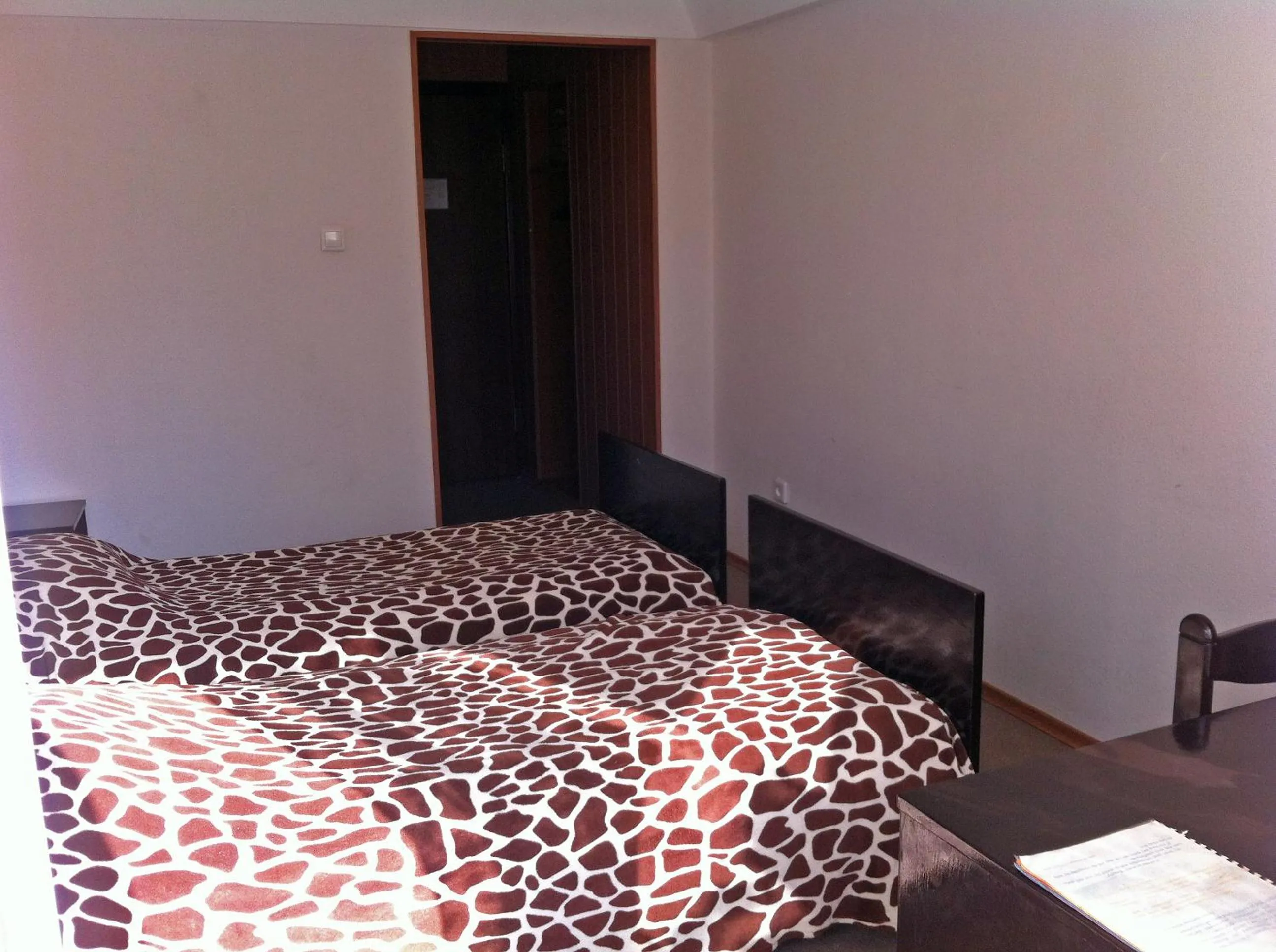 Seating area, Bed in Motel Poltava