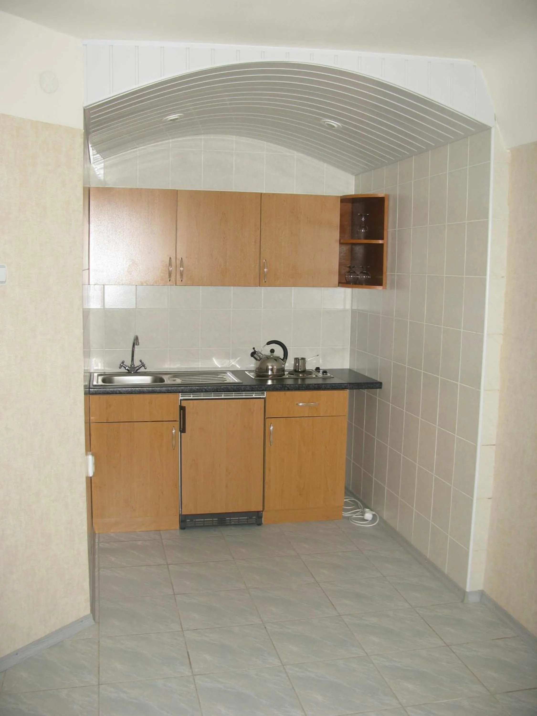 Kitchen or kitchenette in Motel Poltava