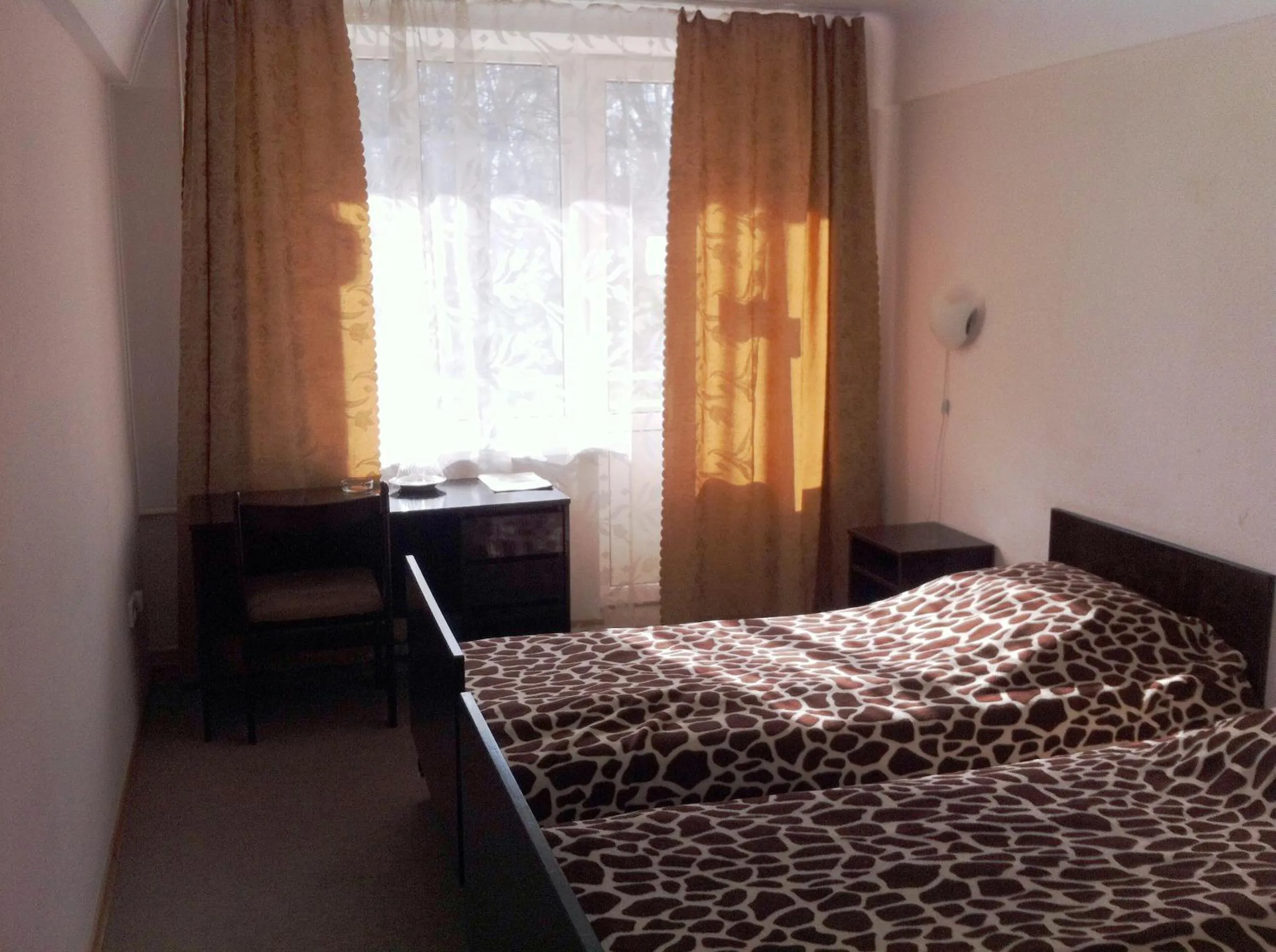 Seating area, Bed in Motel Poltava