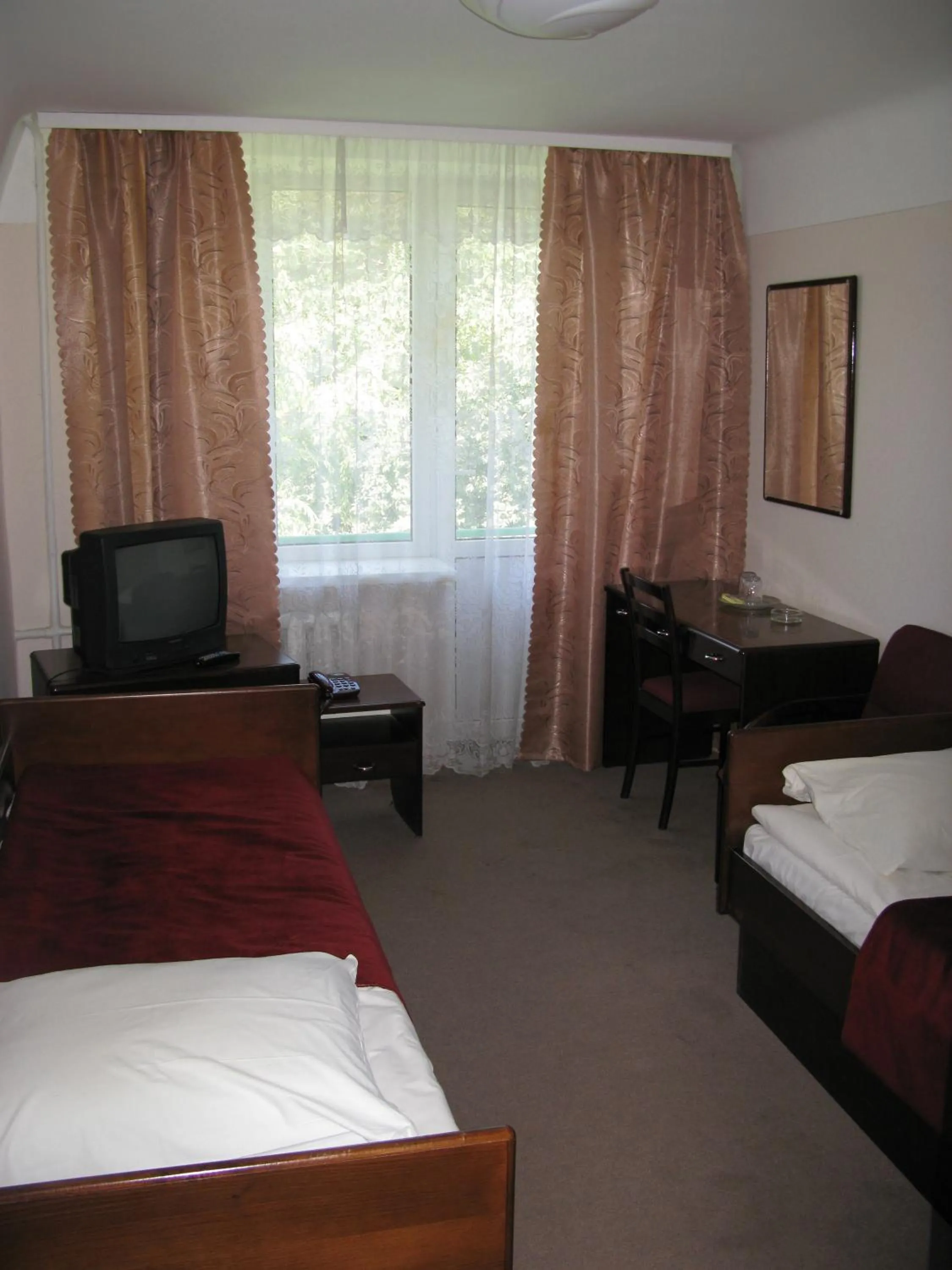 Seating area, Bed in Motel Poltava