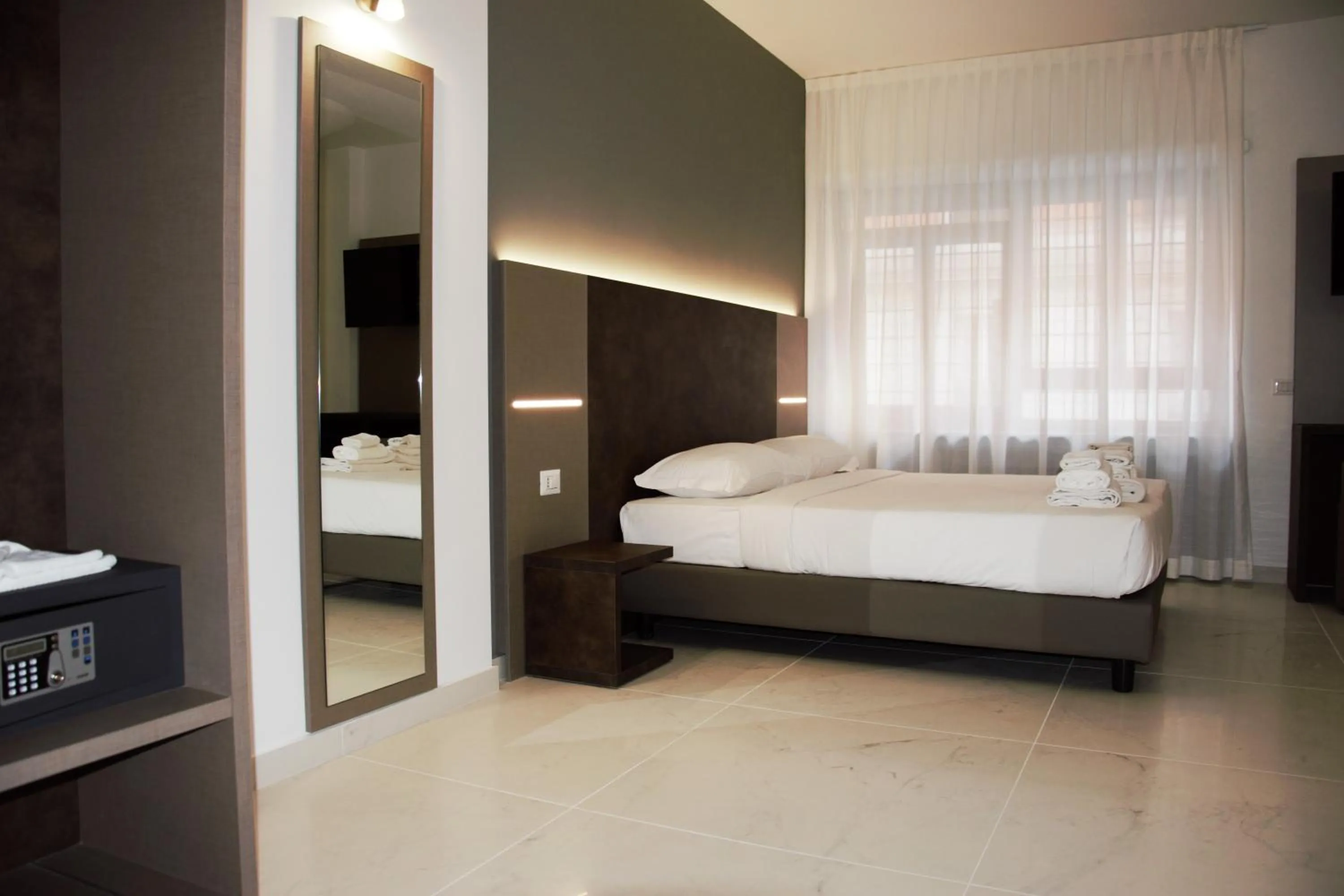 Bed in Domus Dea Roma by Trinità