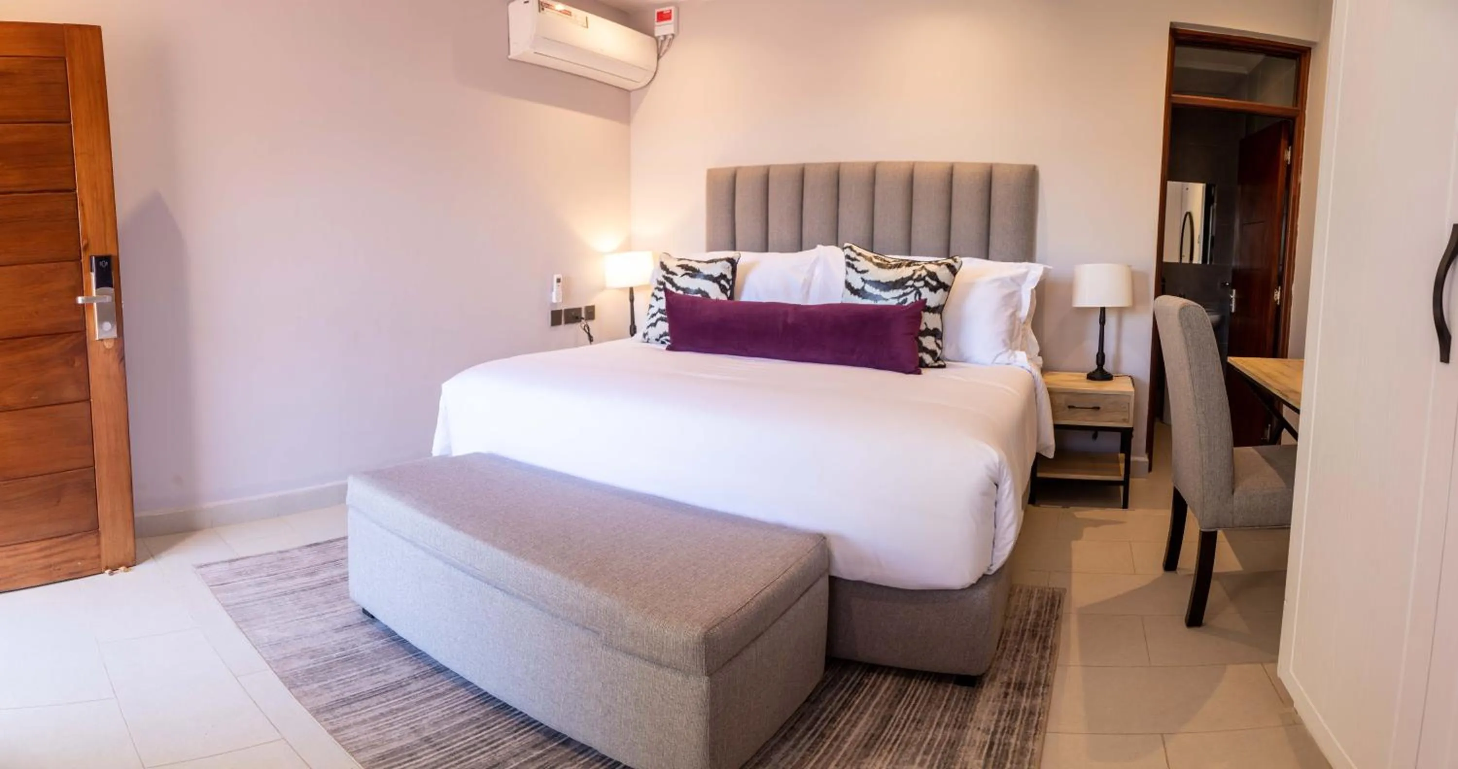 Photo of the whole room, Bed in Pax Manor Muthaiga