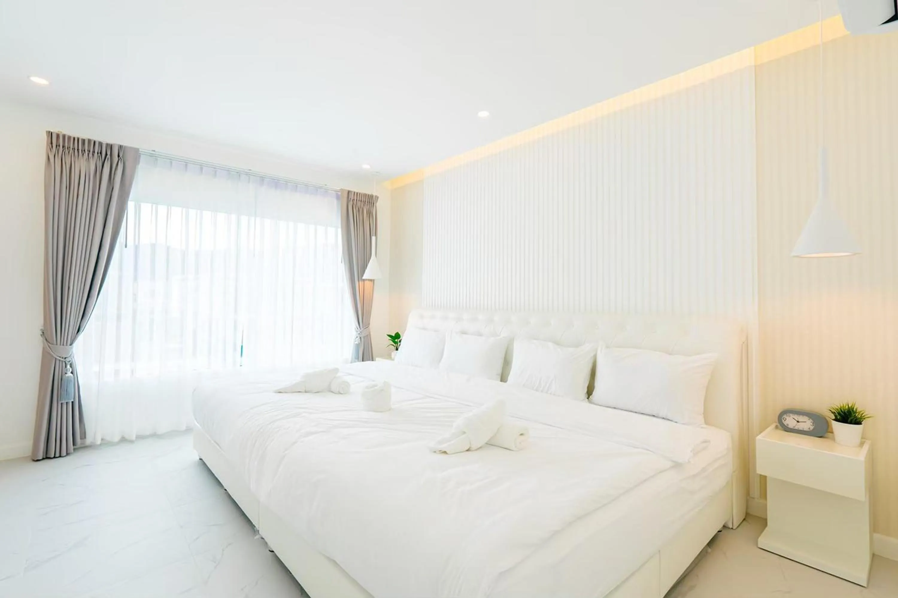 Bed in The Modern Pool Villa Hua Hin