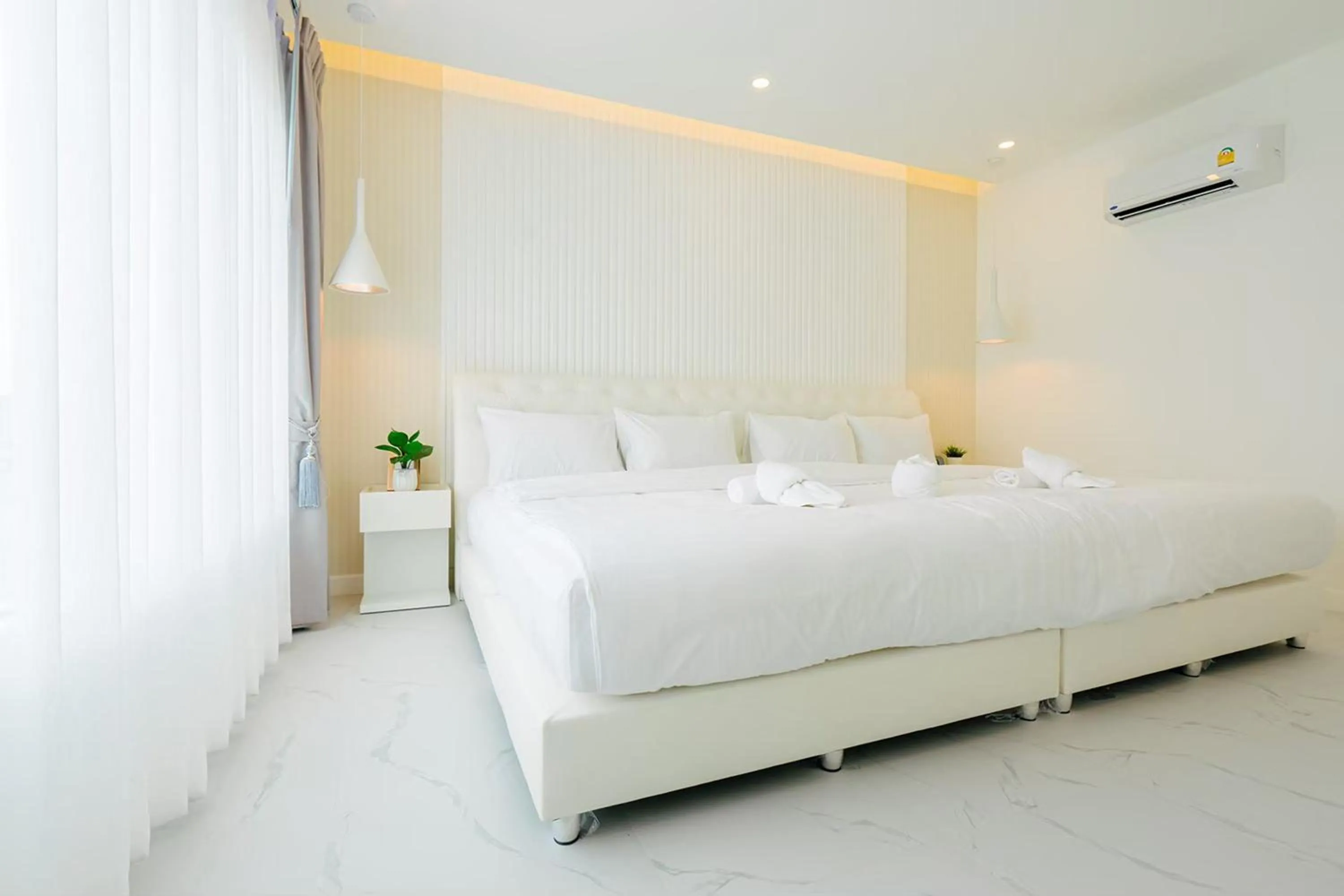 Bed in The Modern Pool Villa Hua Hin
