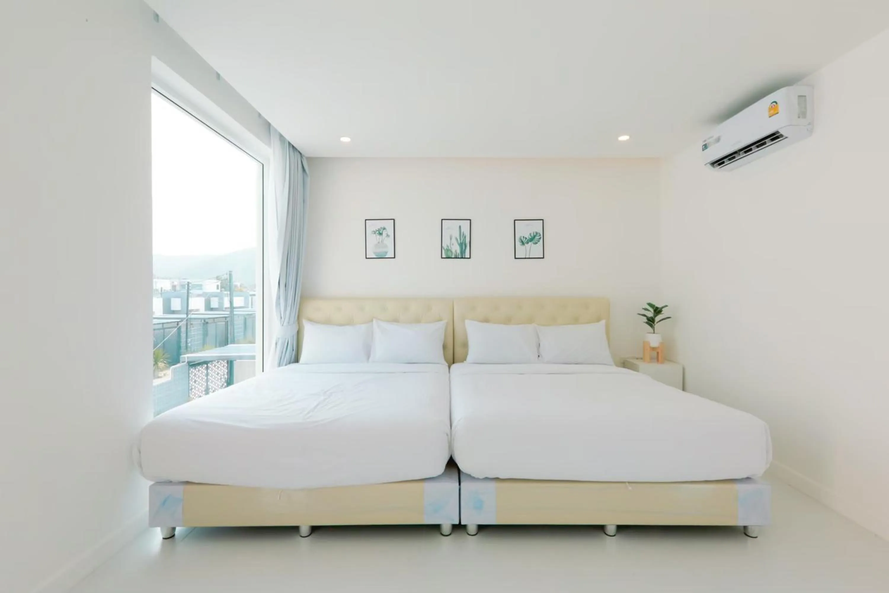 Bed in The Modern Pool Villa Hua Hin