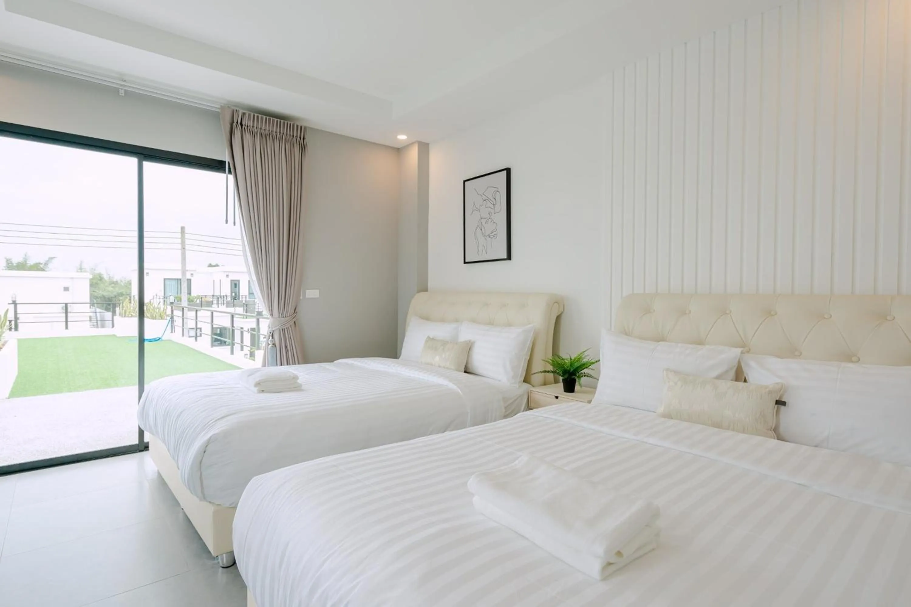 Bed in The Modern Pool Villa Hua Hin