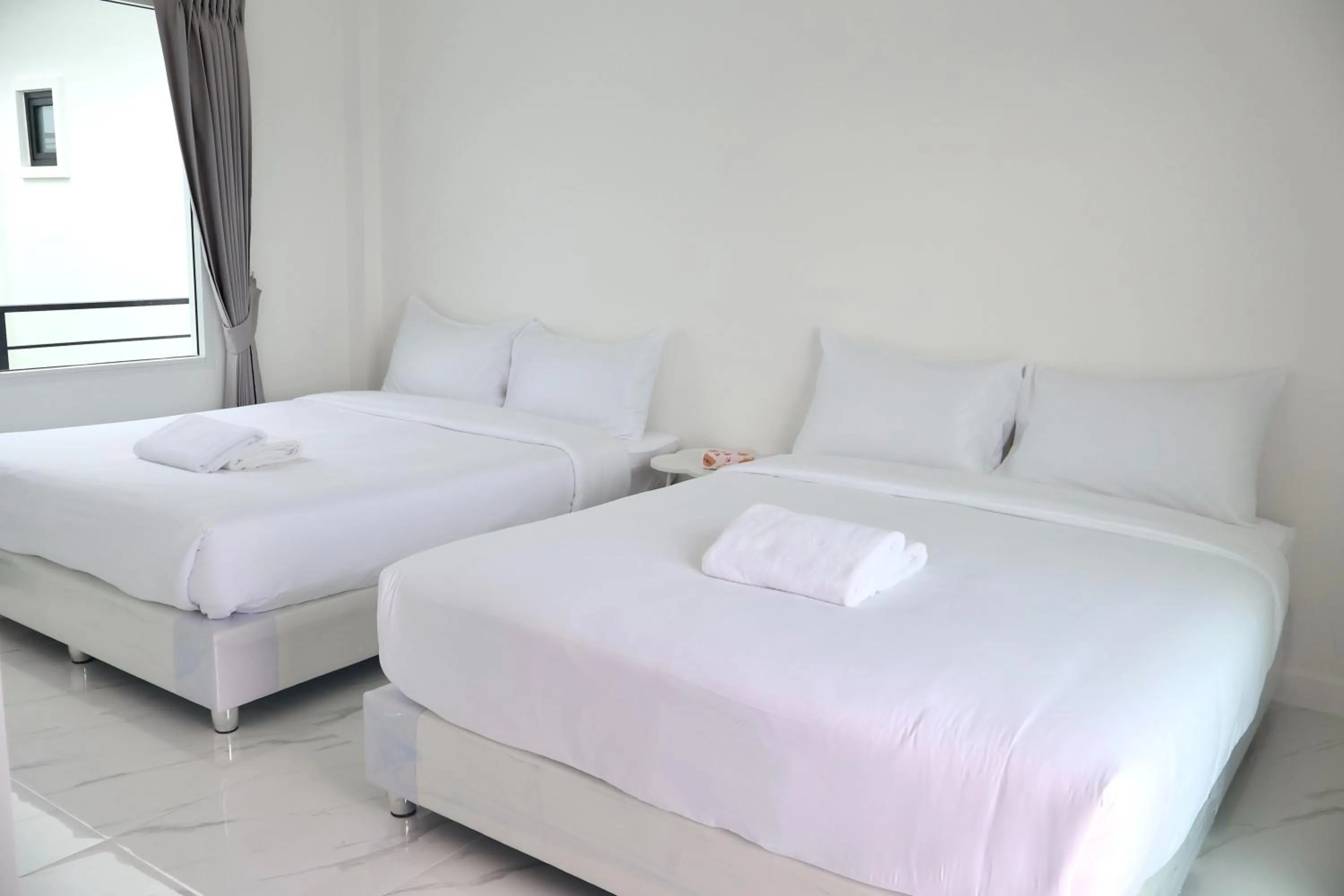 Bed in The Modern Pool Villa Hua Hin