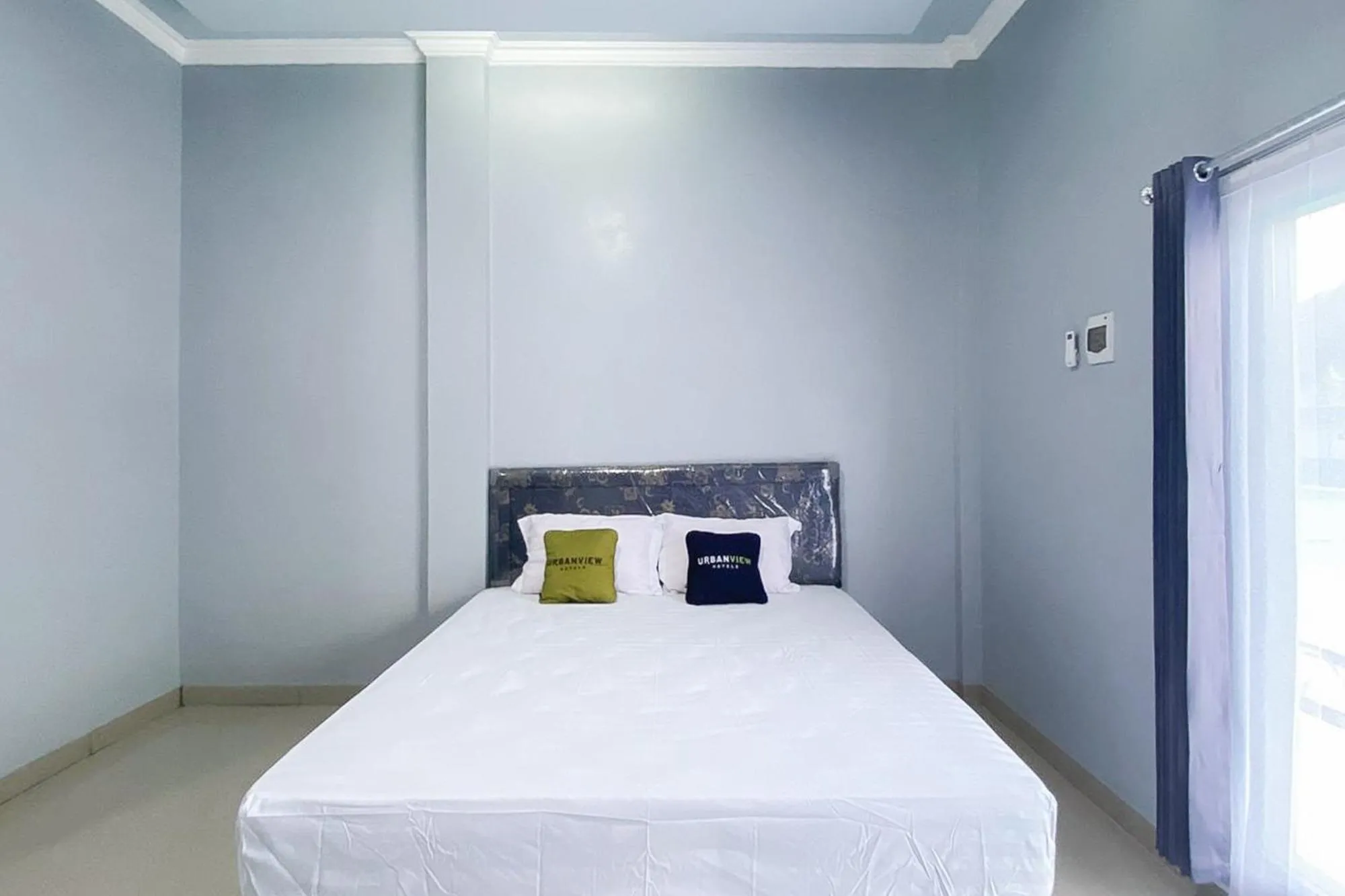 Bedroom, Bed in Urbanview Hotel Menteng Jaya GH Palangka Raya