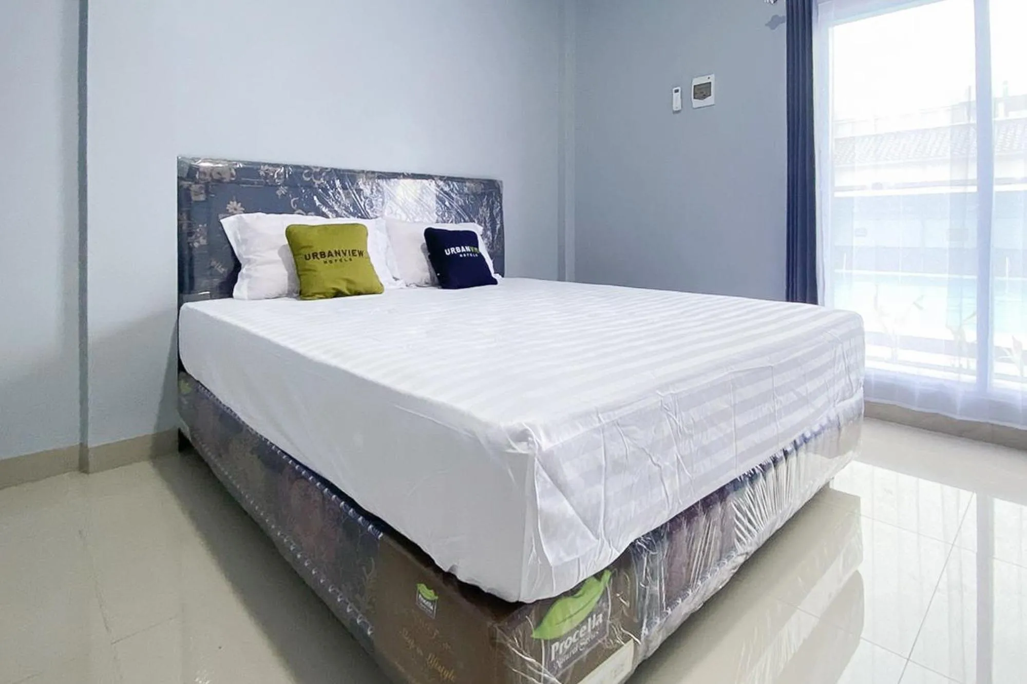 Bedroom, Bed in Urbanview Hotel Menteng Jaya GH Palangka Raya