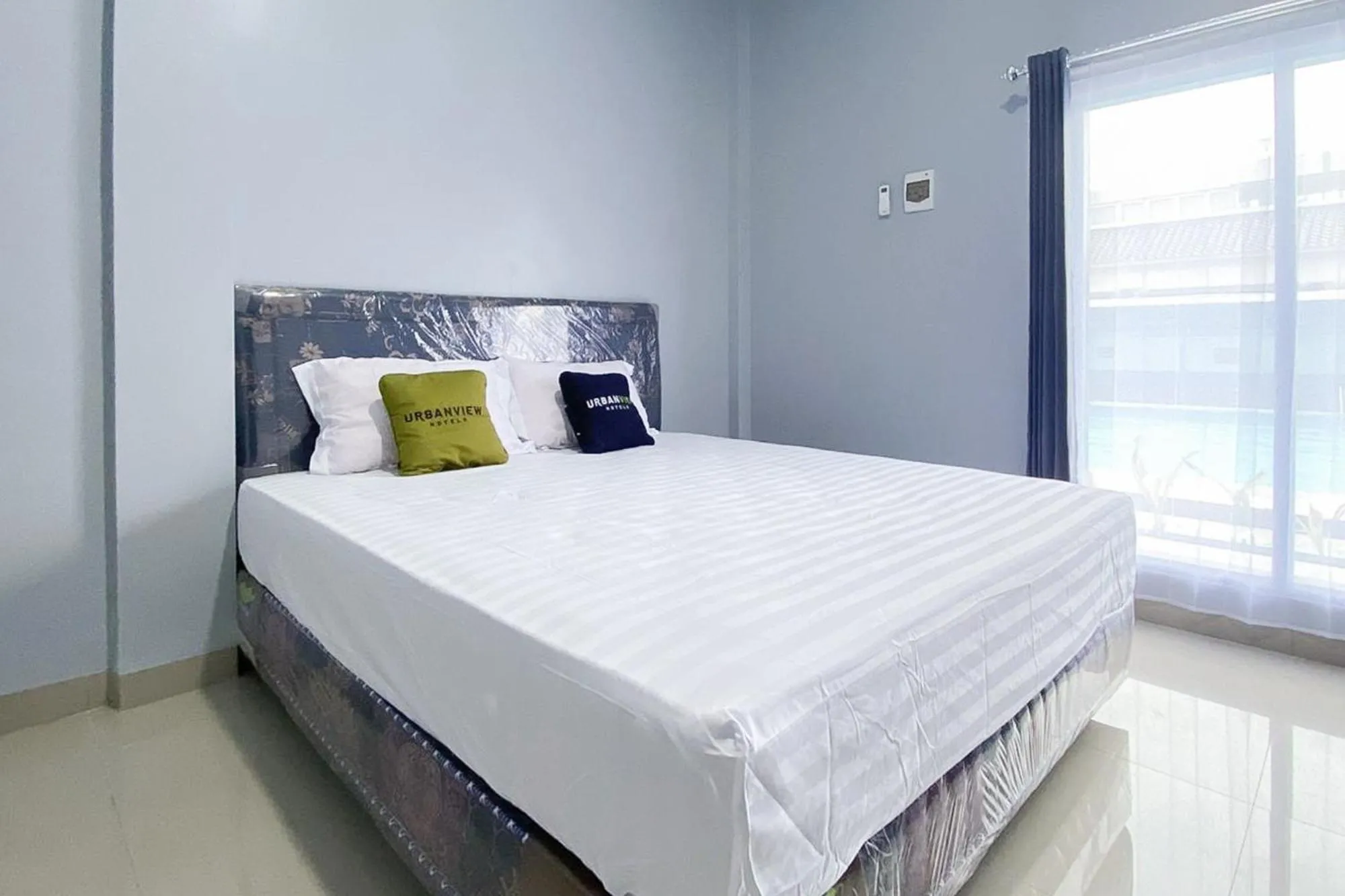 Bedroom, Bed in Urbanview Hotel Menteng Jaya GH Palangka Raya