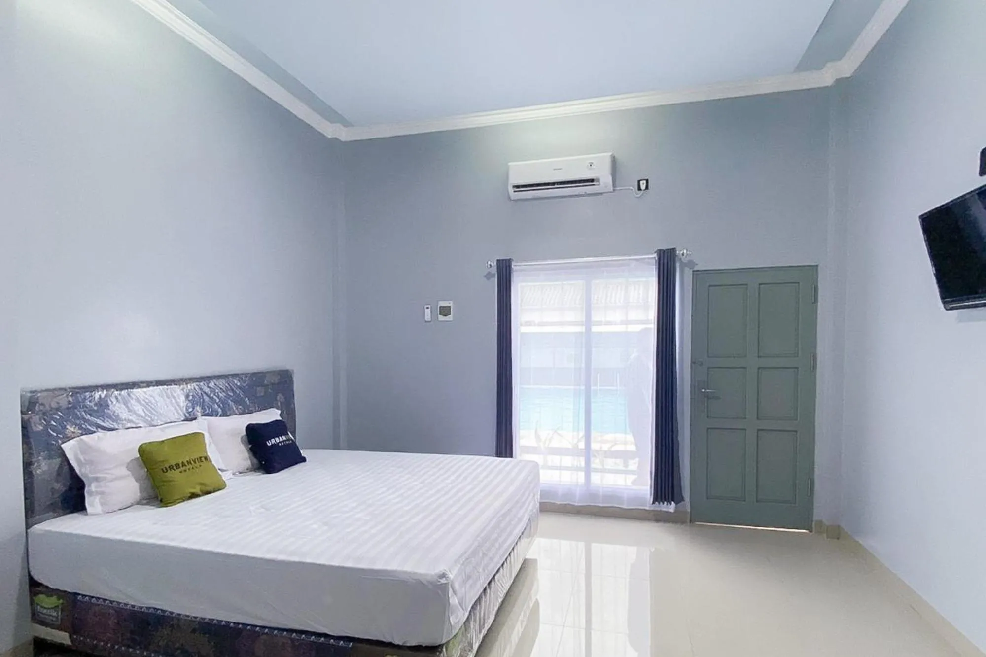 Bedroom, Bed in Urbanview Hotel Menteng Jaya GH Palangka Raya