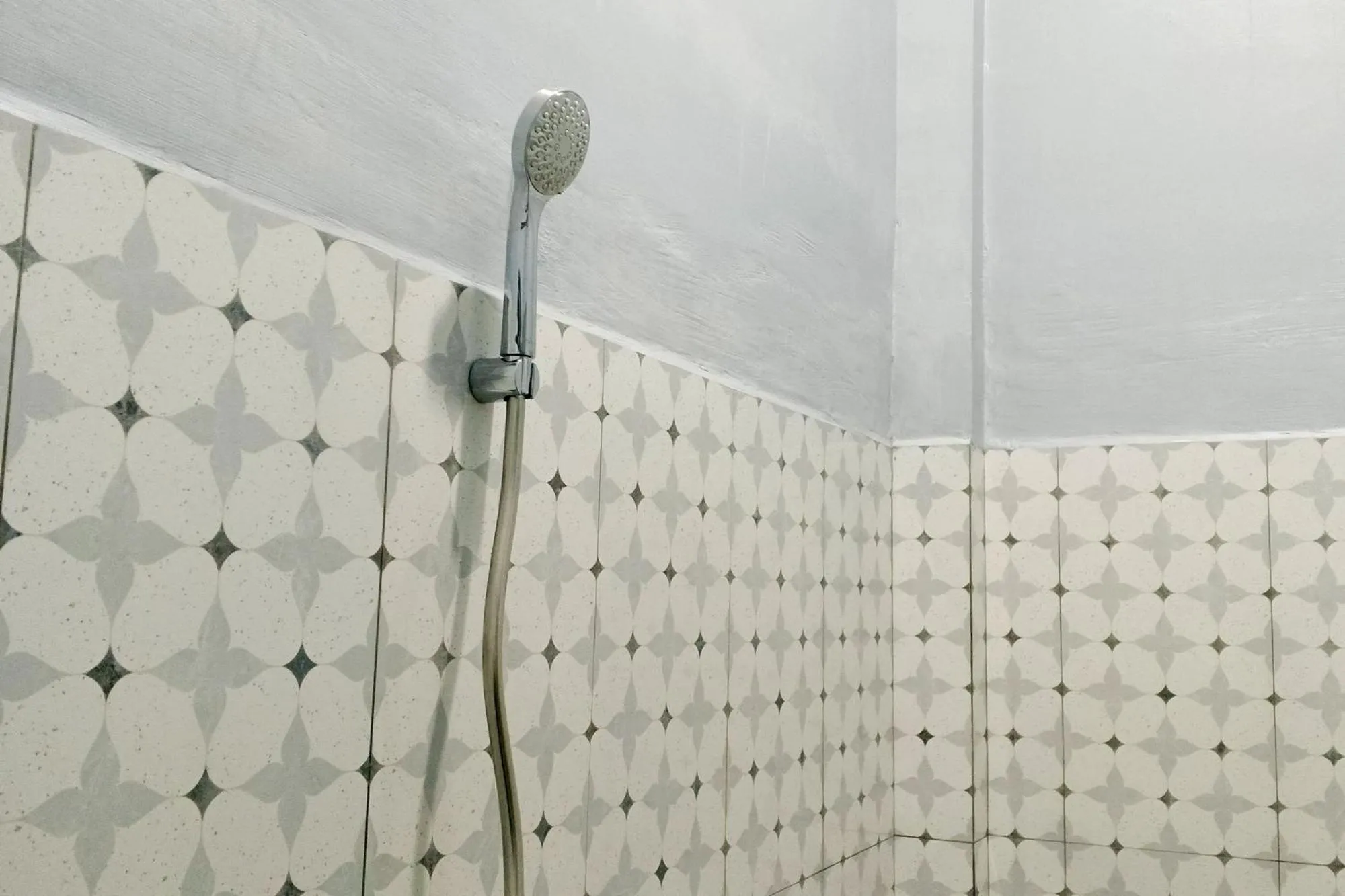 Bathroom in Urbanview Hotel Menteng Jaya GH Palangka Raya