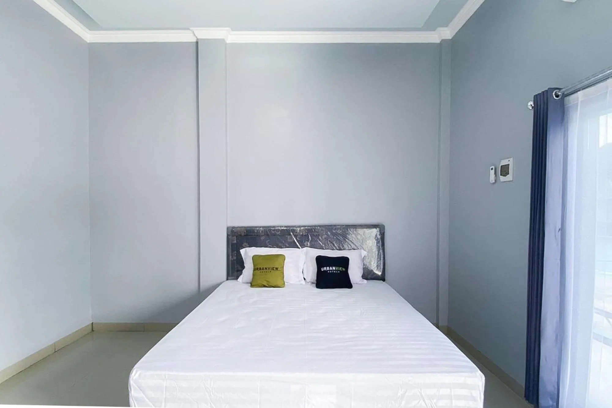 Bedroom, Bed in Urbanview Hotel Menteng Jaya GH Palangka Raya
