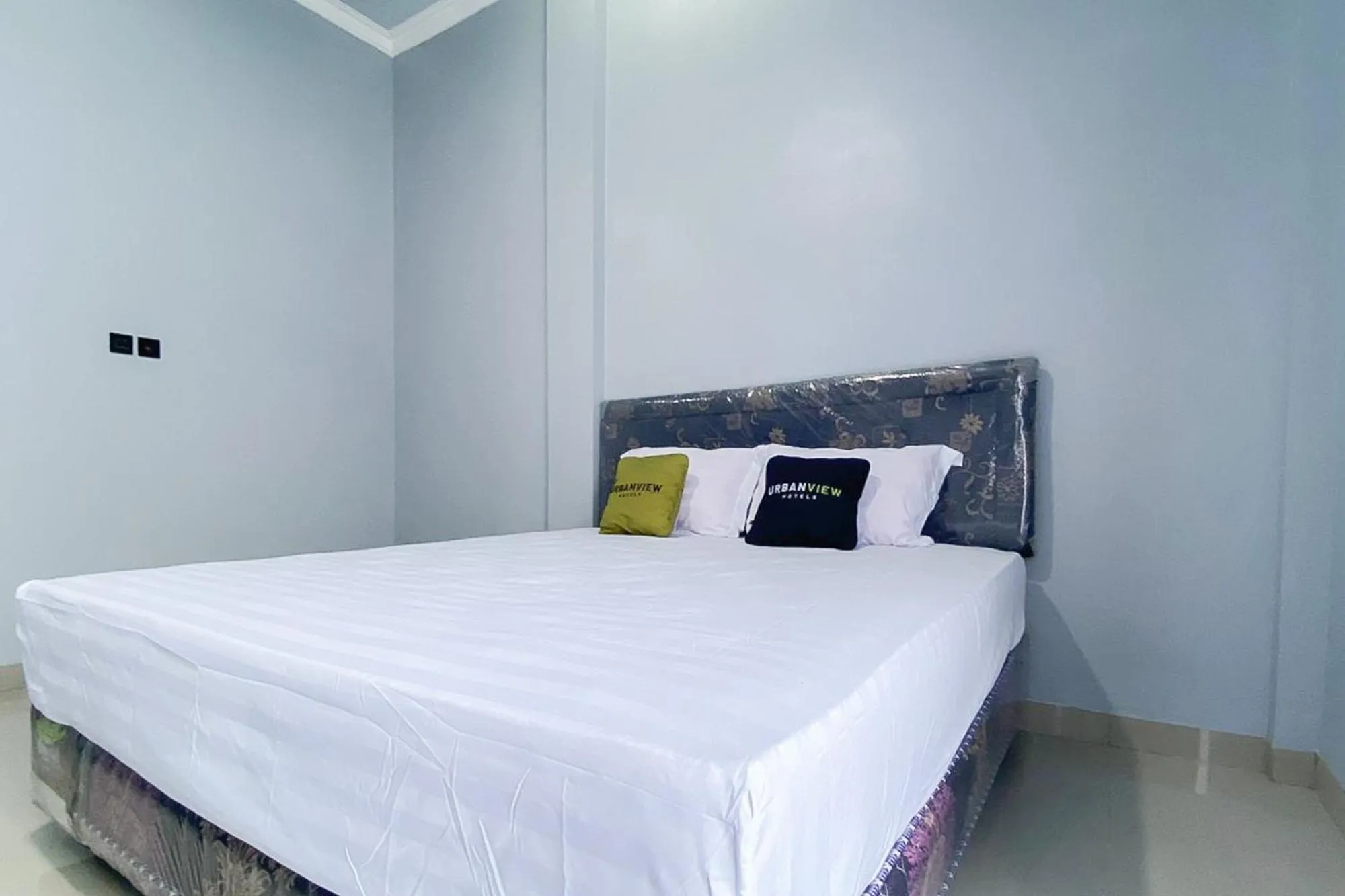 Bedroom, Bed in Urbanview Hotel Menteng Jaya GH Palangka Raya