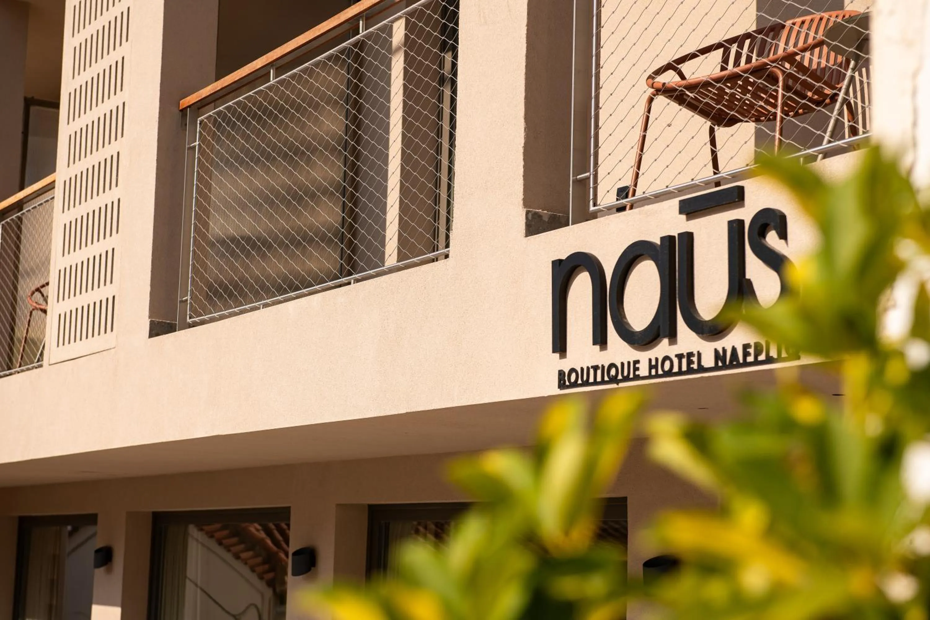 Property logo or sign in Naus Hotel