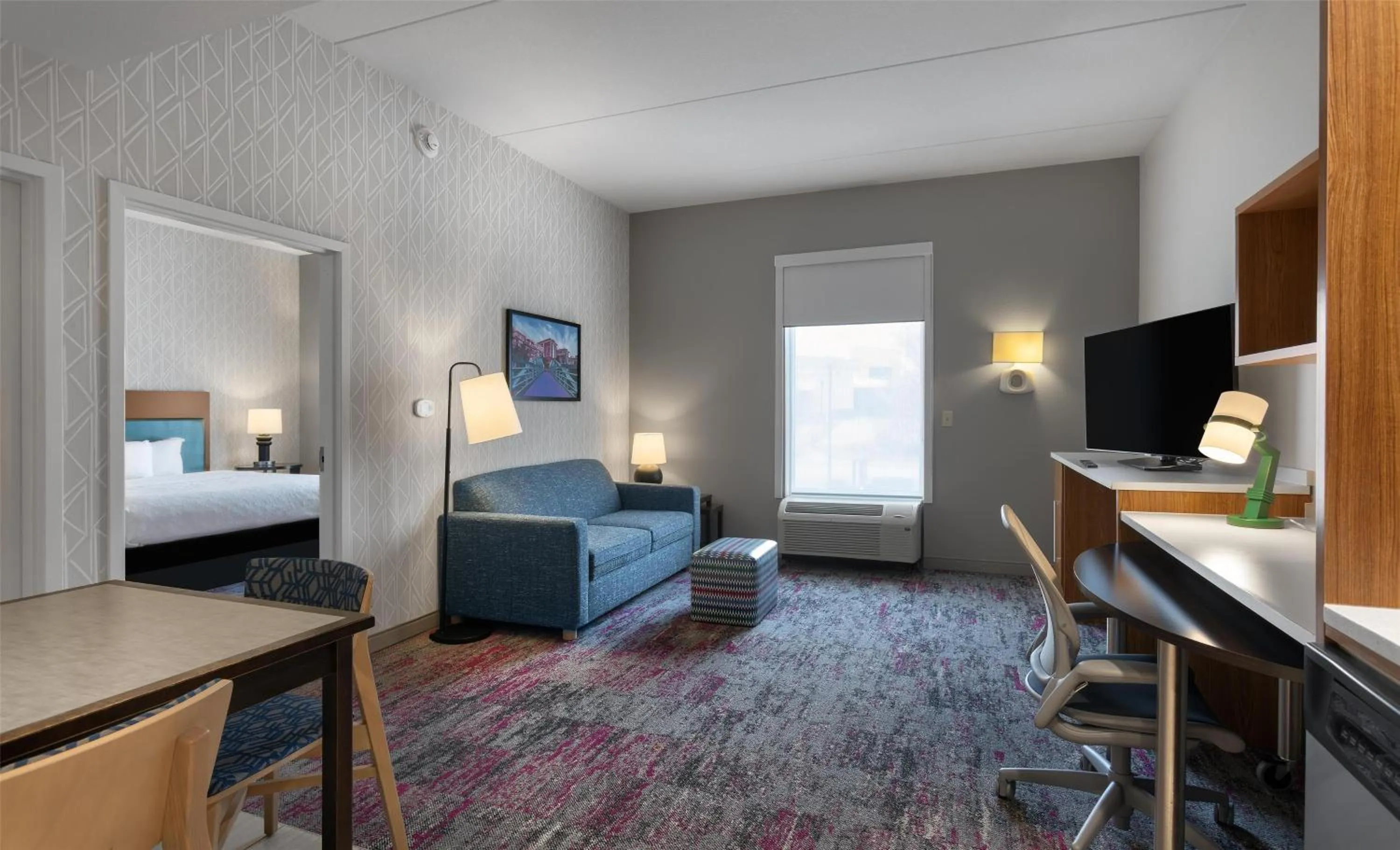 Living room, Bed in Home2 Suites by Hilton Greenville Airport