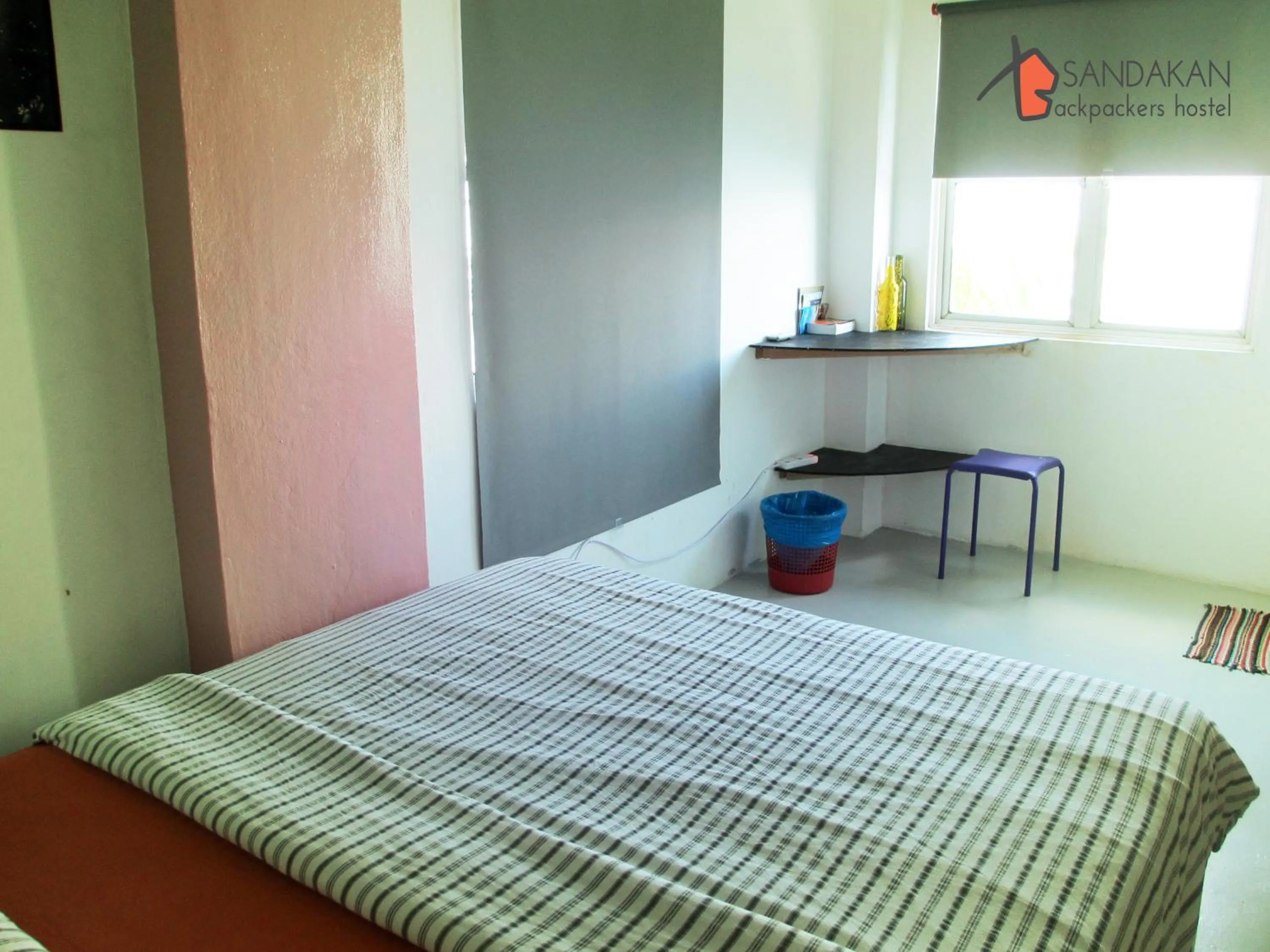 Bed in Sandakan Backpackers Hostel