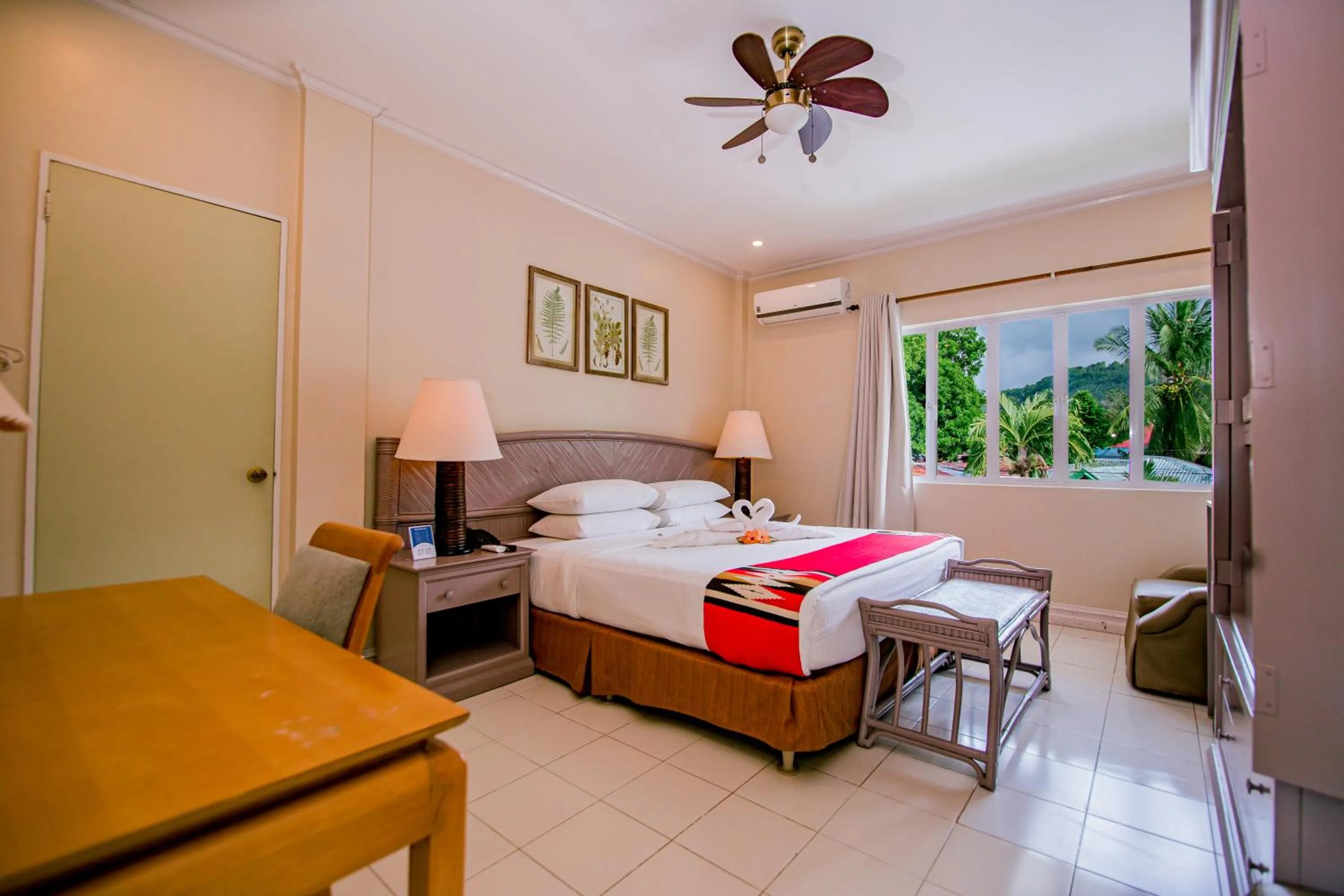 Photo of the whole room, Bed in Paras Beach Resort - Camiguin