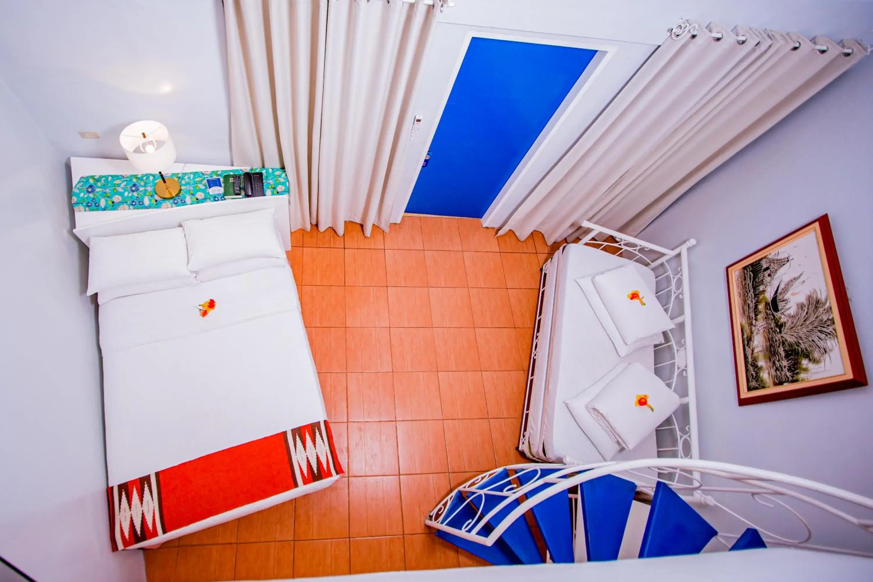 Photo of the whole room, Bed in Paras Beach Resort - Camiguin Photo of the whole room, Bed in Paras Beach Resort - Camiguin