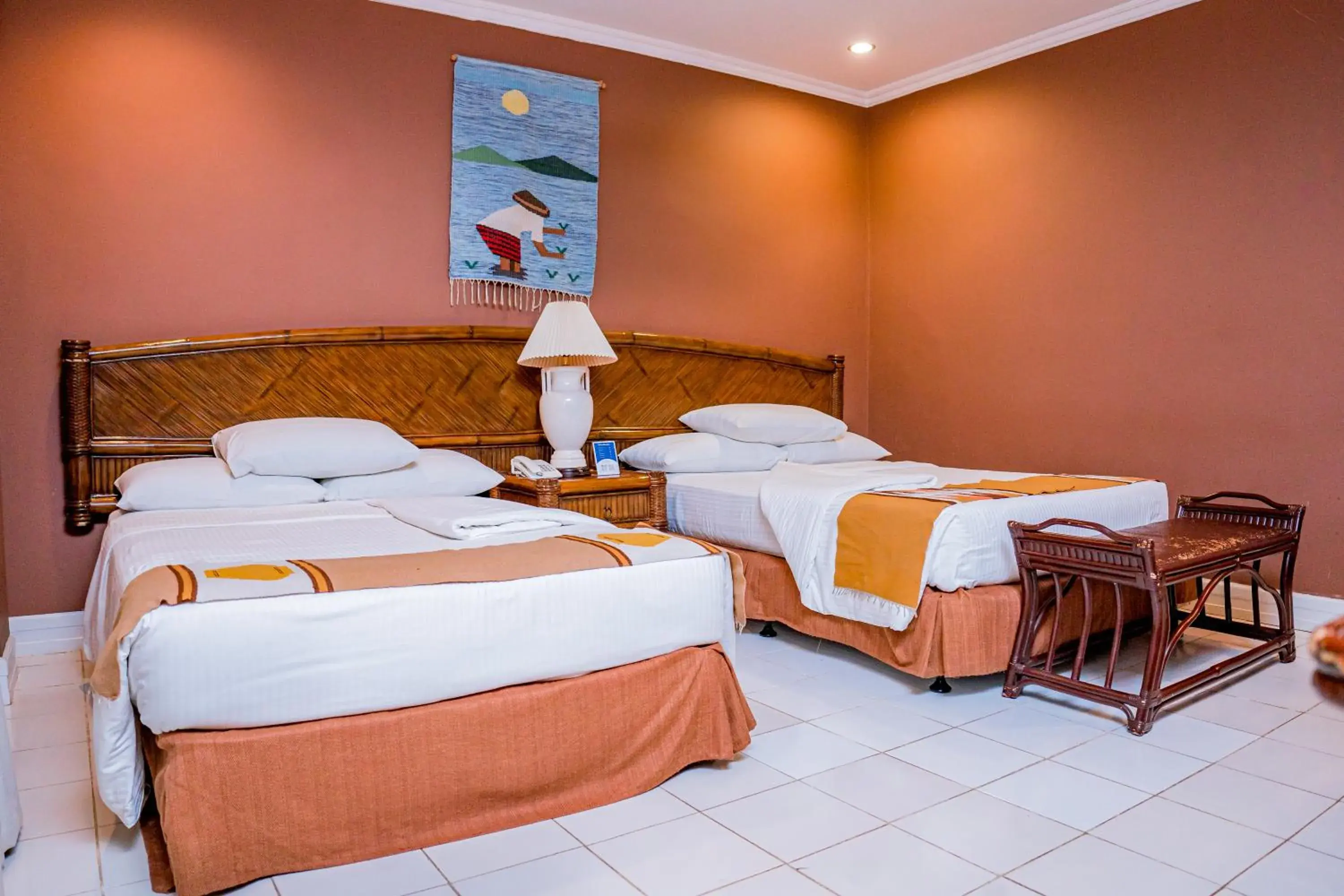 Bedroom, Bed in Paras Beach Resort - Camiguin Bedroom, Bed in Paras Beach Resort - Camiguin