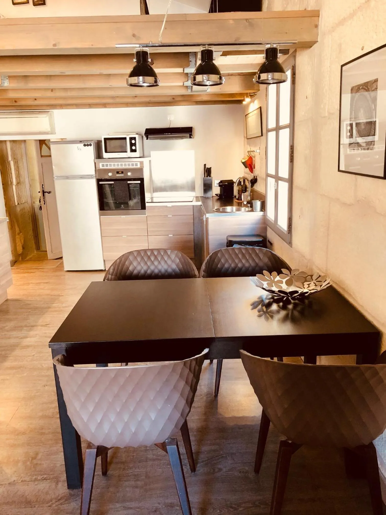 Dining area in Appartements "La Chambre D'Ami"